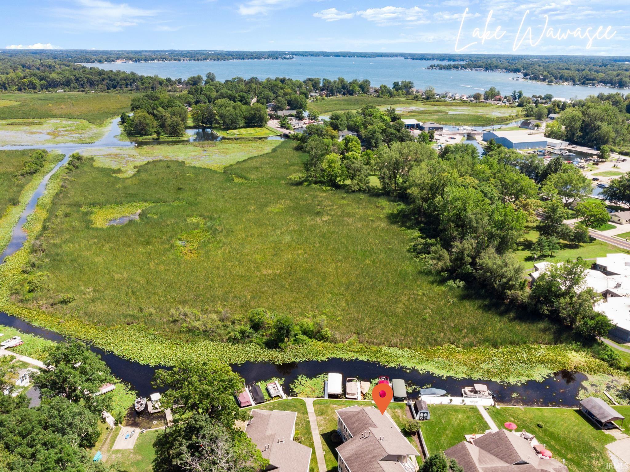Image 3: Aerial perspective of condo on Lake Wawasee - located between Syracuse Lake and Lake Wawasee, Lake Wawasee Condo