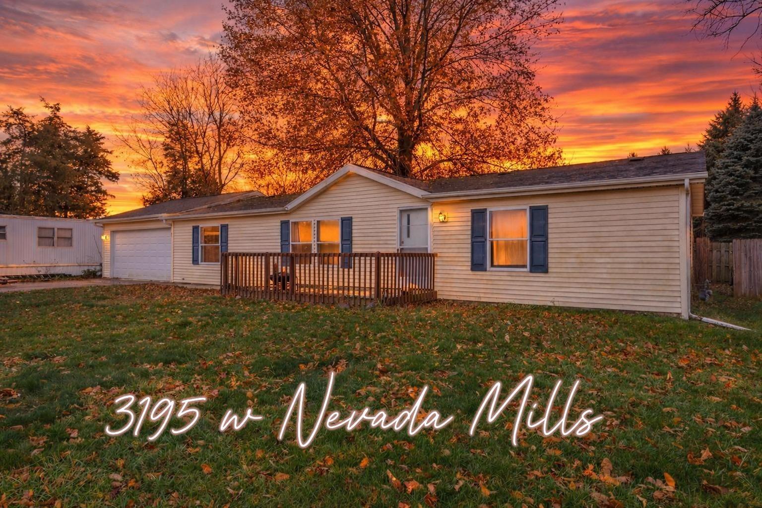 Image 0: Single story home featuring a wooden deck and an attached garage, Front Of Structure