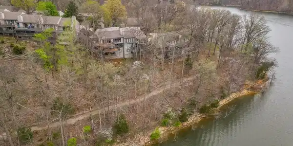 Image 3: Drone / aerial view of a large body of water and a forest, Aerial View Image 3: Drone / aerial view of a large body of water and a forest, Aerial View