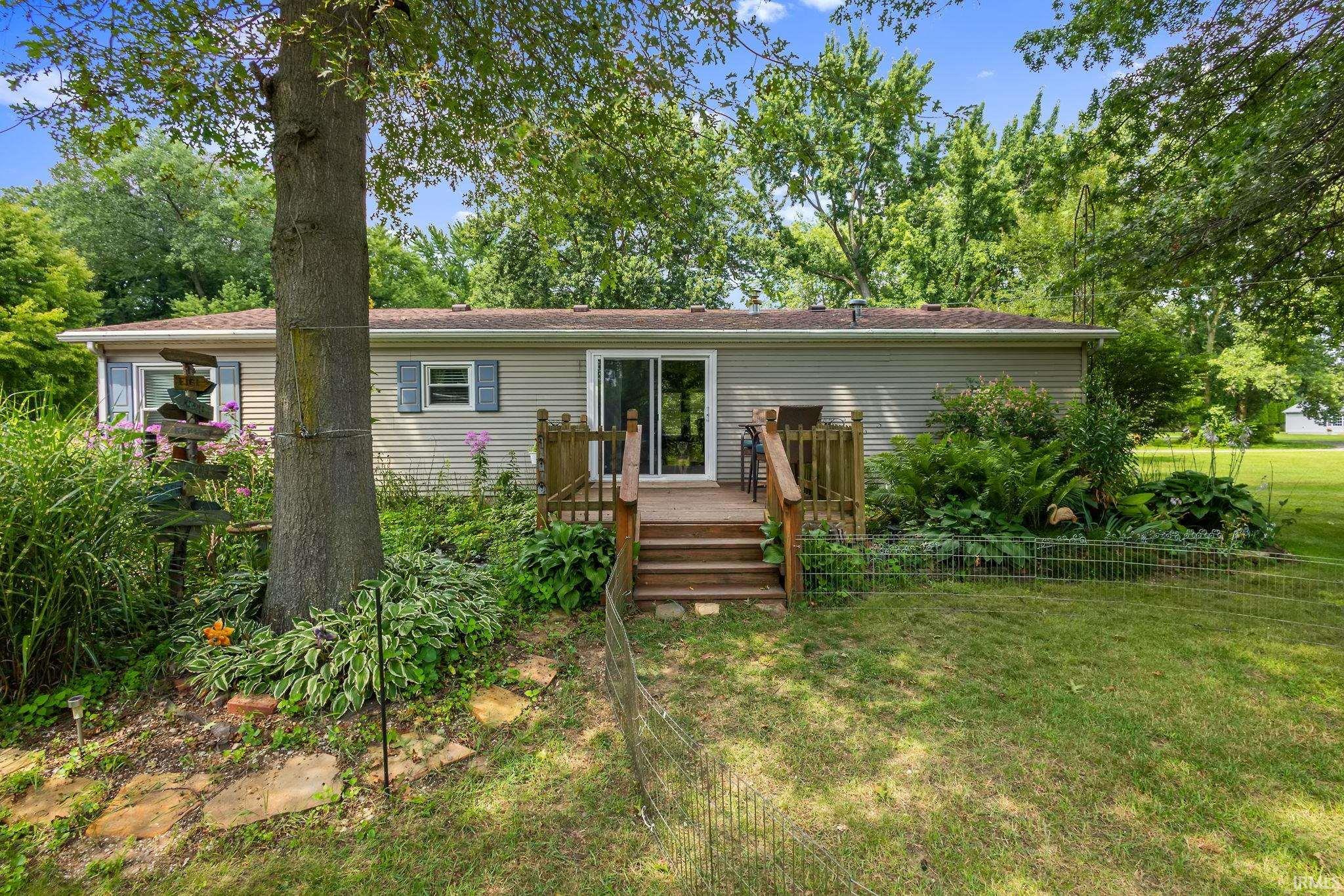 Image 1: Rear view of property with a yard, Back Of Structure Image 1: Rear view of property with a yard, Back Of Structure
