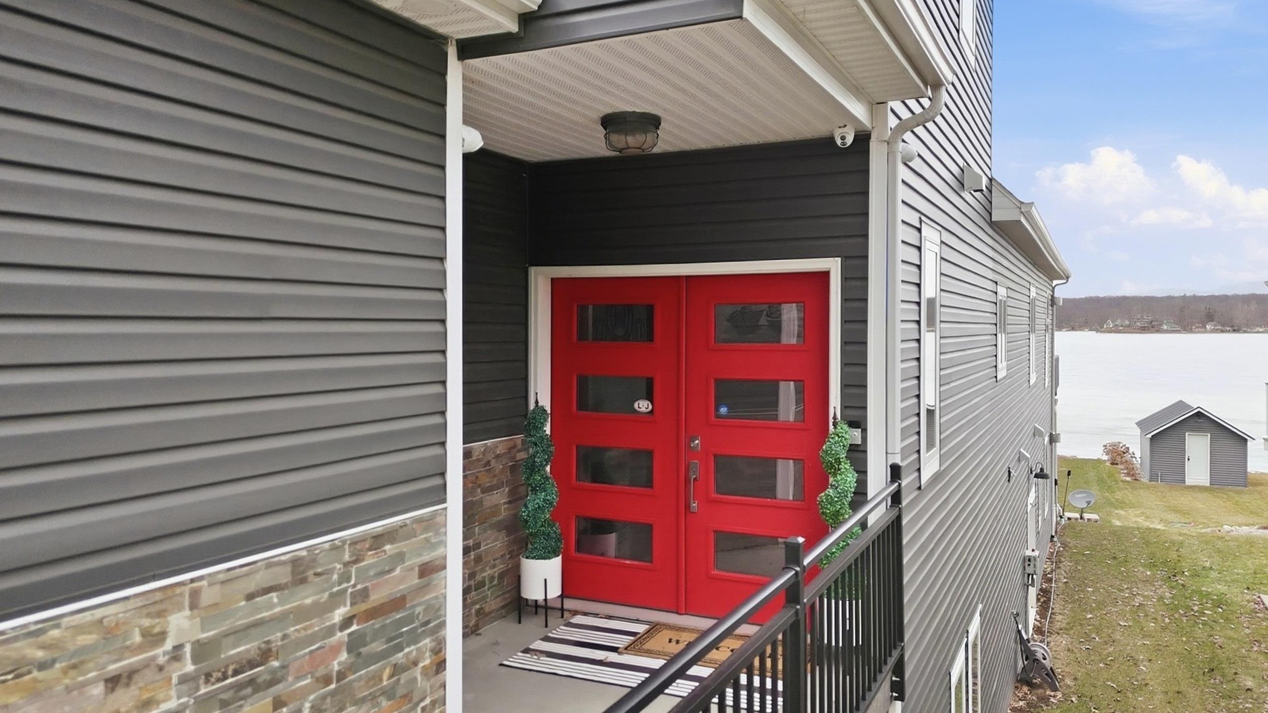Image 3: Property entrance with stone siding, Entry Image 3: Property entrance with stone siding, Entry