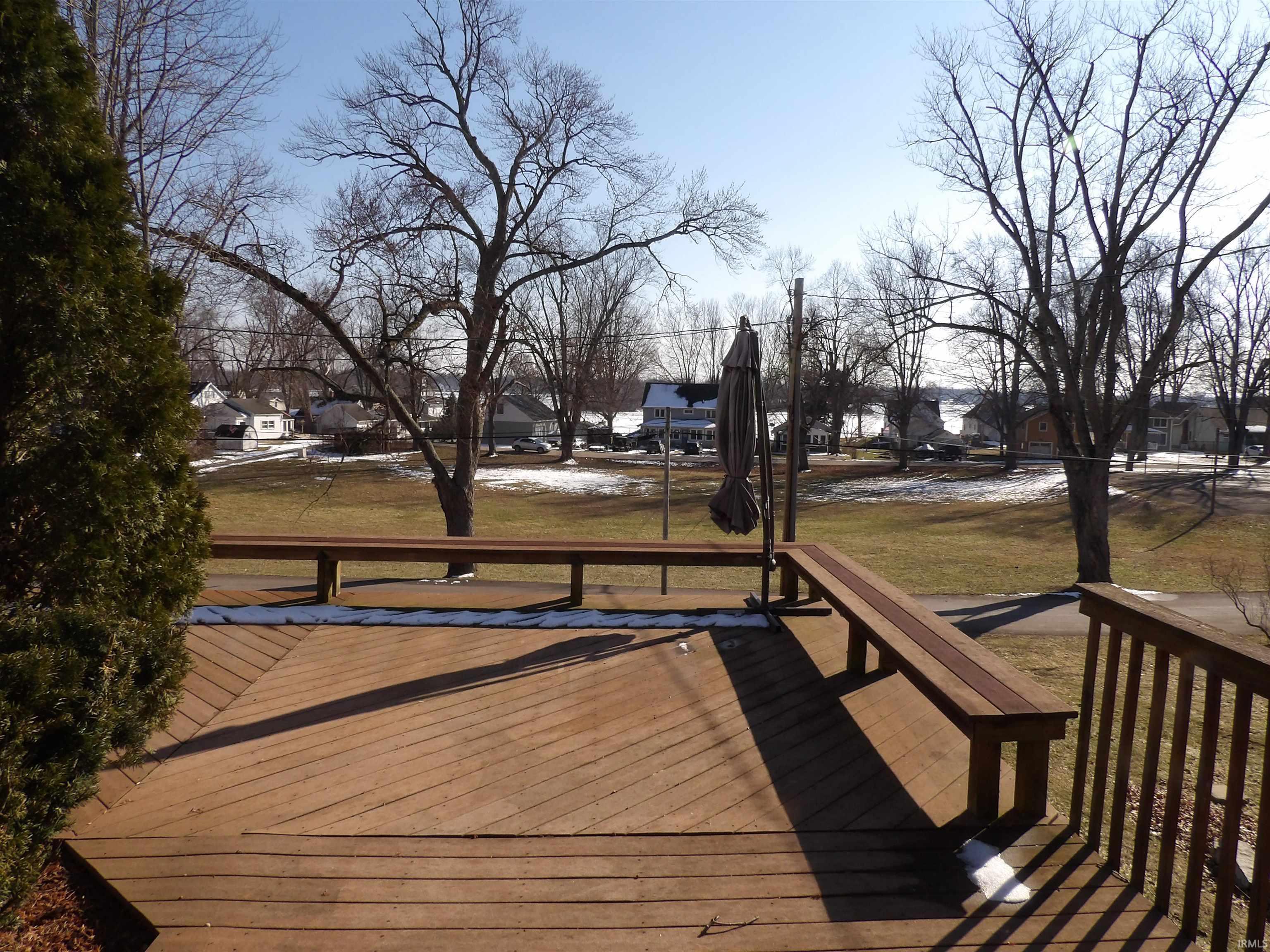 Image 3: Deck featuring a residential view and a yard, Deck