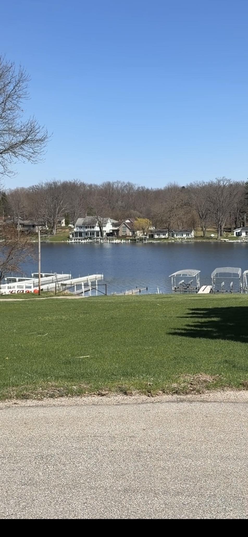 Image 3: Dock area with a lawn and a water view, Dock