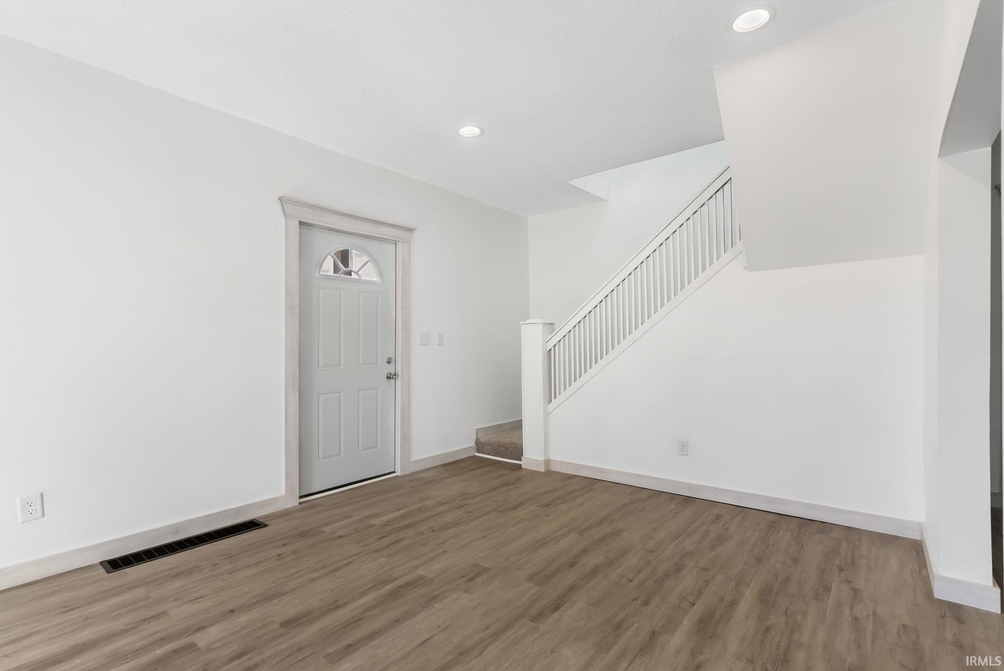 Image 3: Entrance foyer with wood finished floors and recessed lighting, Entrance Foyer Image 3: Entrance foyer with wood finished floors and recessed lighting, Entrance Foyer
