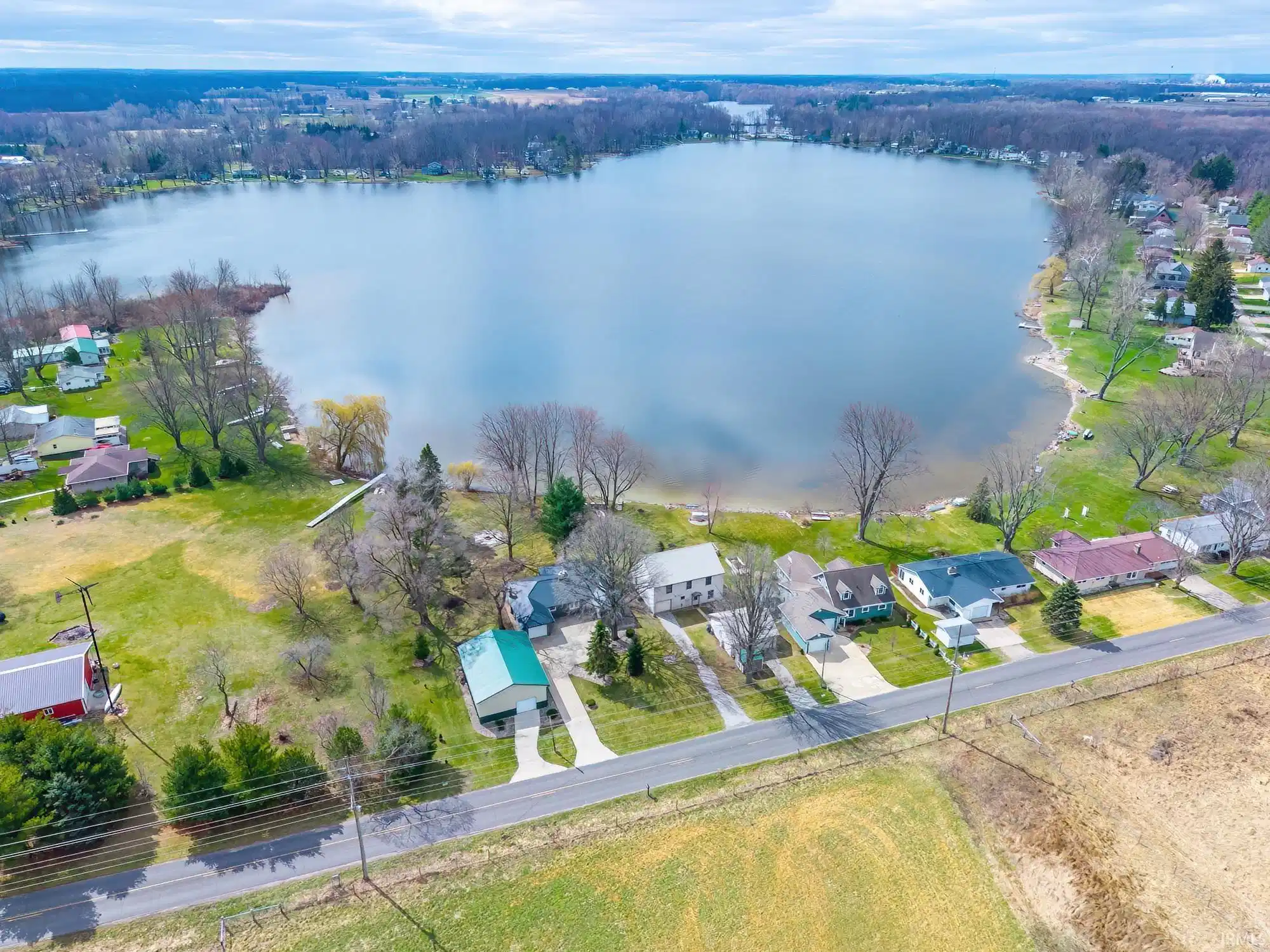 Image 0: 120 ft lakefront remodeled 3 bath 2 bed home with 30x40 pole building on .68 acres Image 0: 120 ft lakefront remodeled 3 bath 2 bed home with 30x40 pole building on .68 acres
