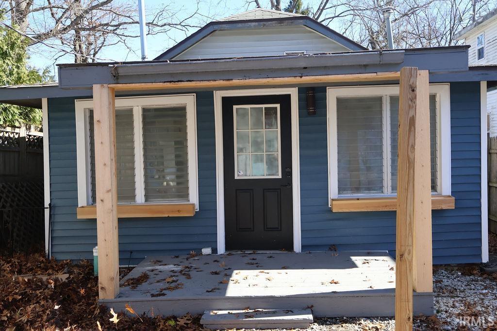Image 0: Entrance to property featuring a deck, Entry
