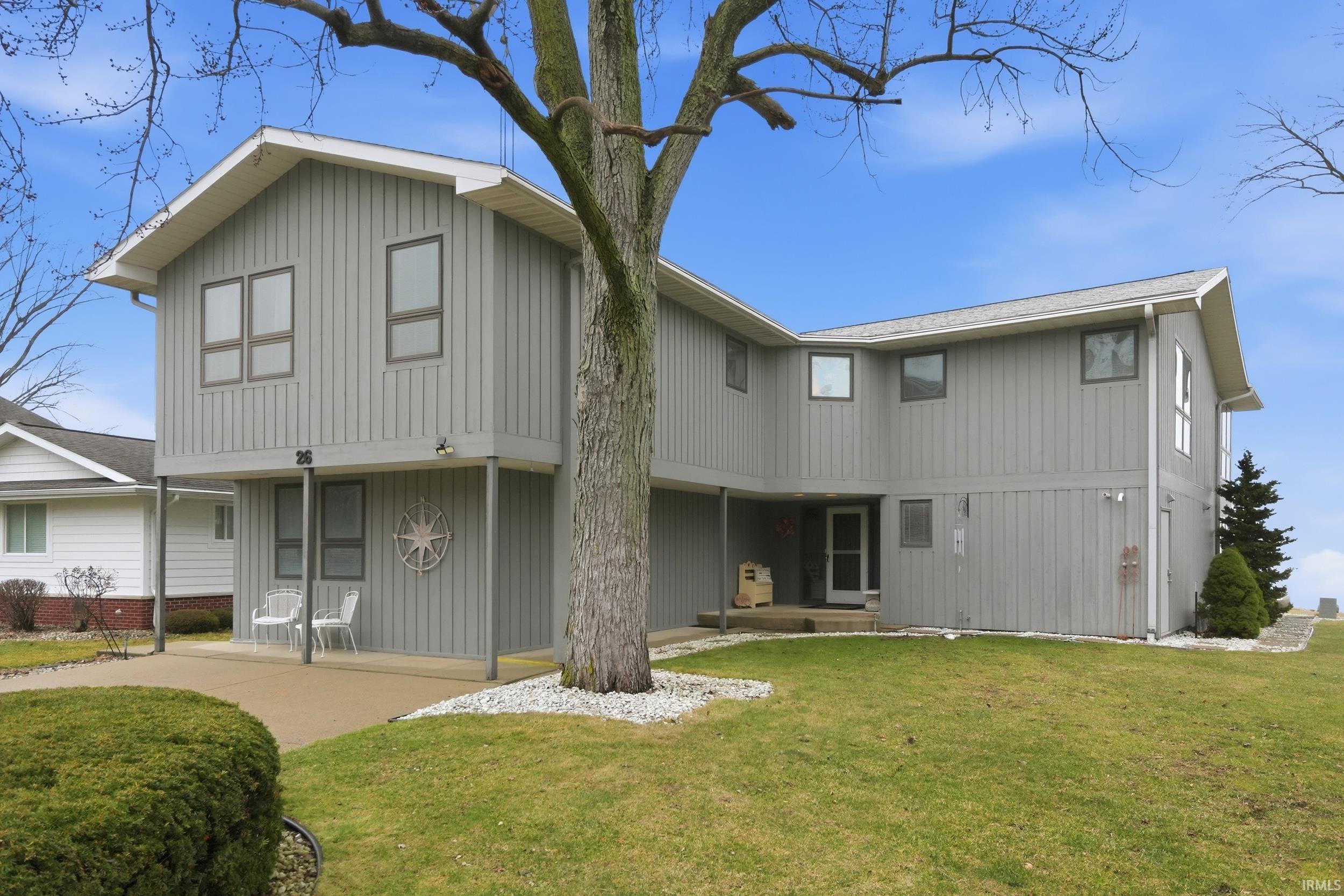 Image 2: Back of property with a lawn, Back Of Structure