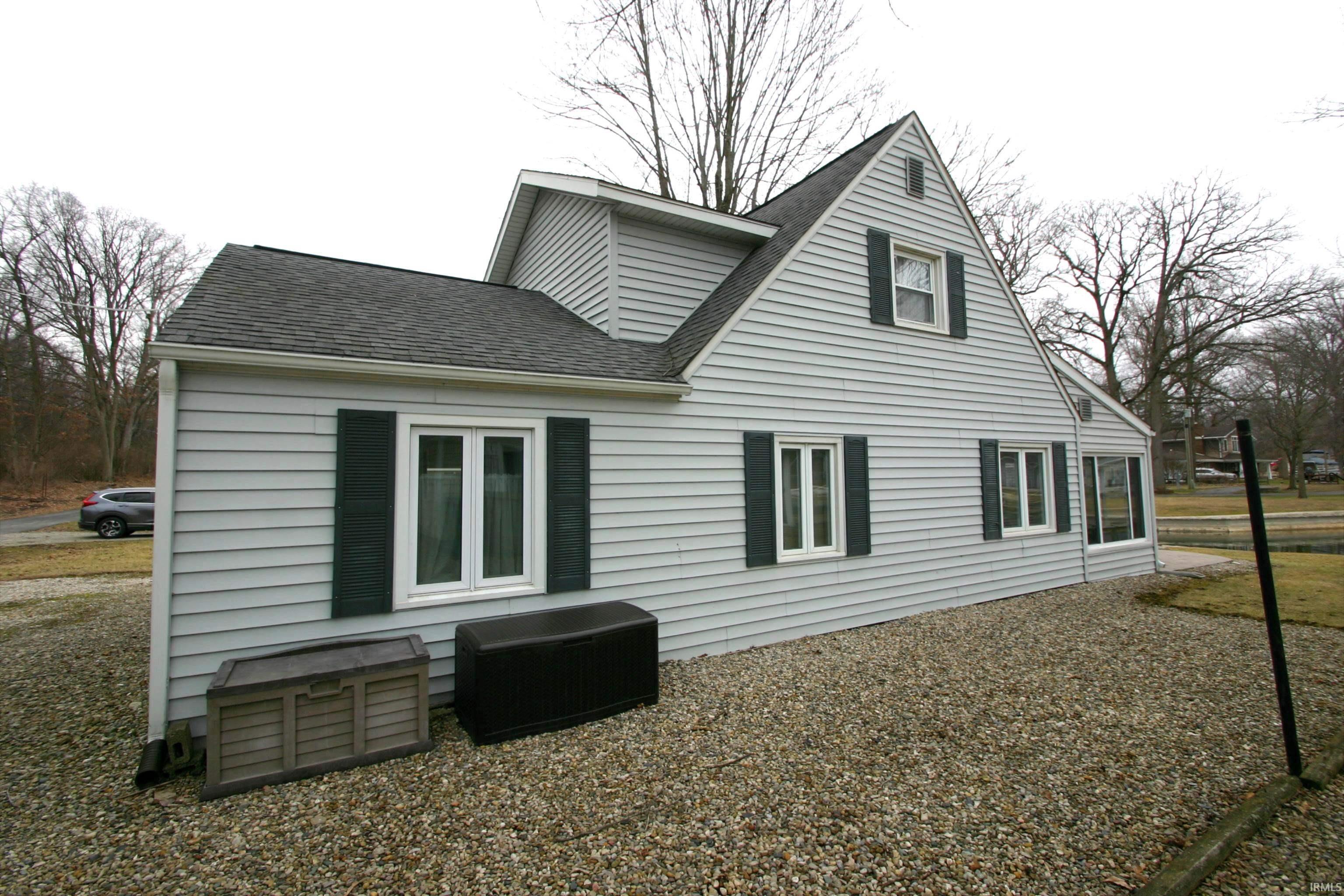 Image 2: Just another view of the other side of the home. This is the southside of the home., View from Side of Home