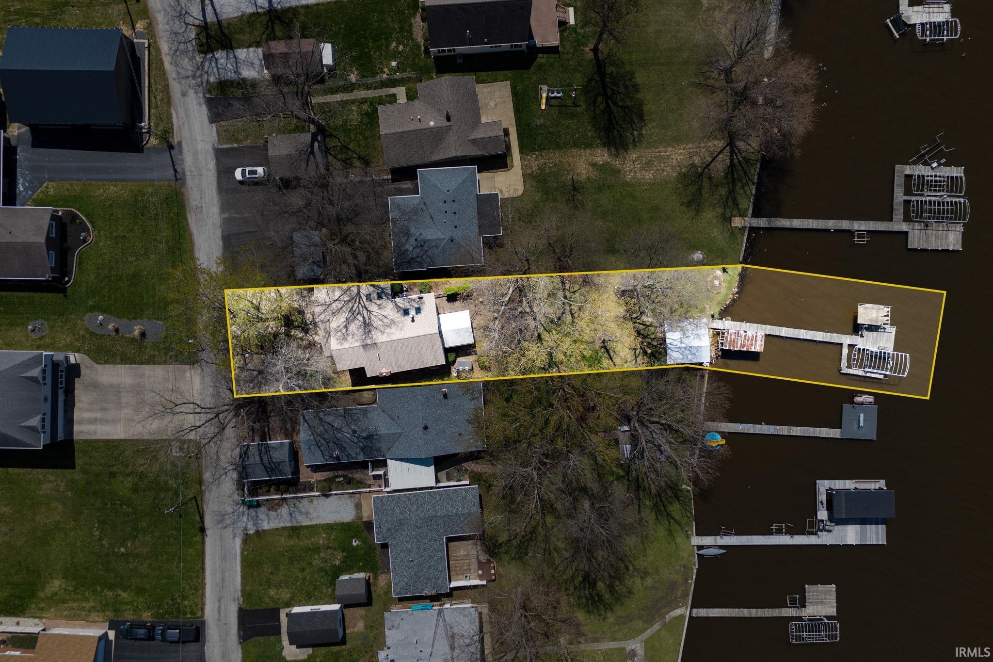Image 1: Aerial overview of property's location with property parcel outlined, Aerial View