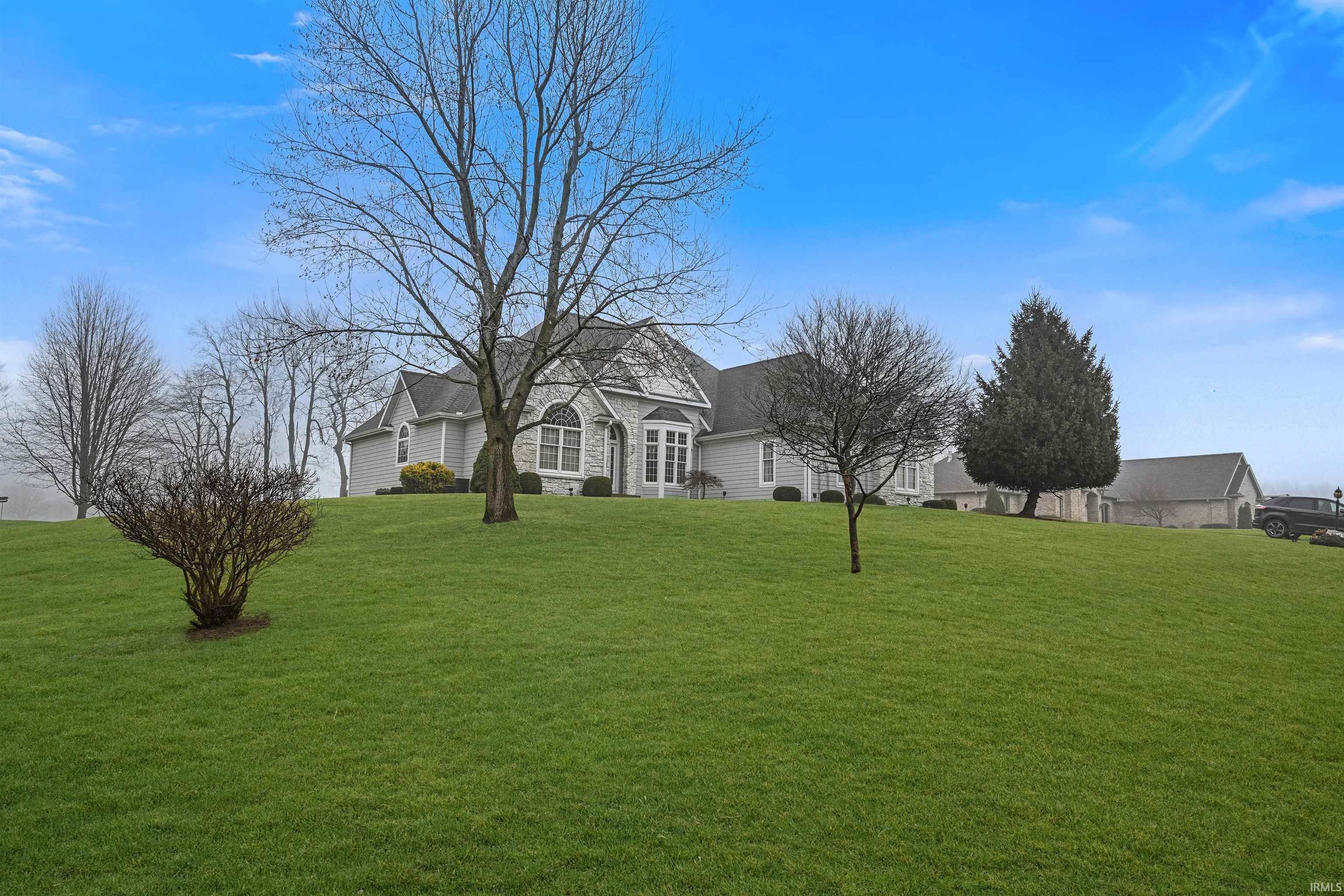 Image 1: View of front of house with a front yard, Front Of Structure