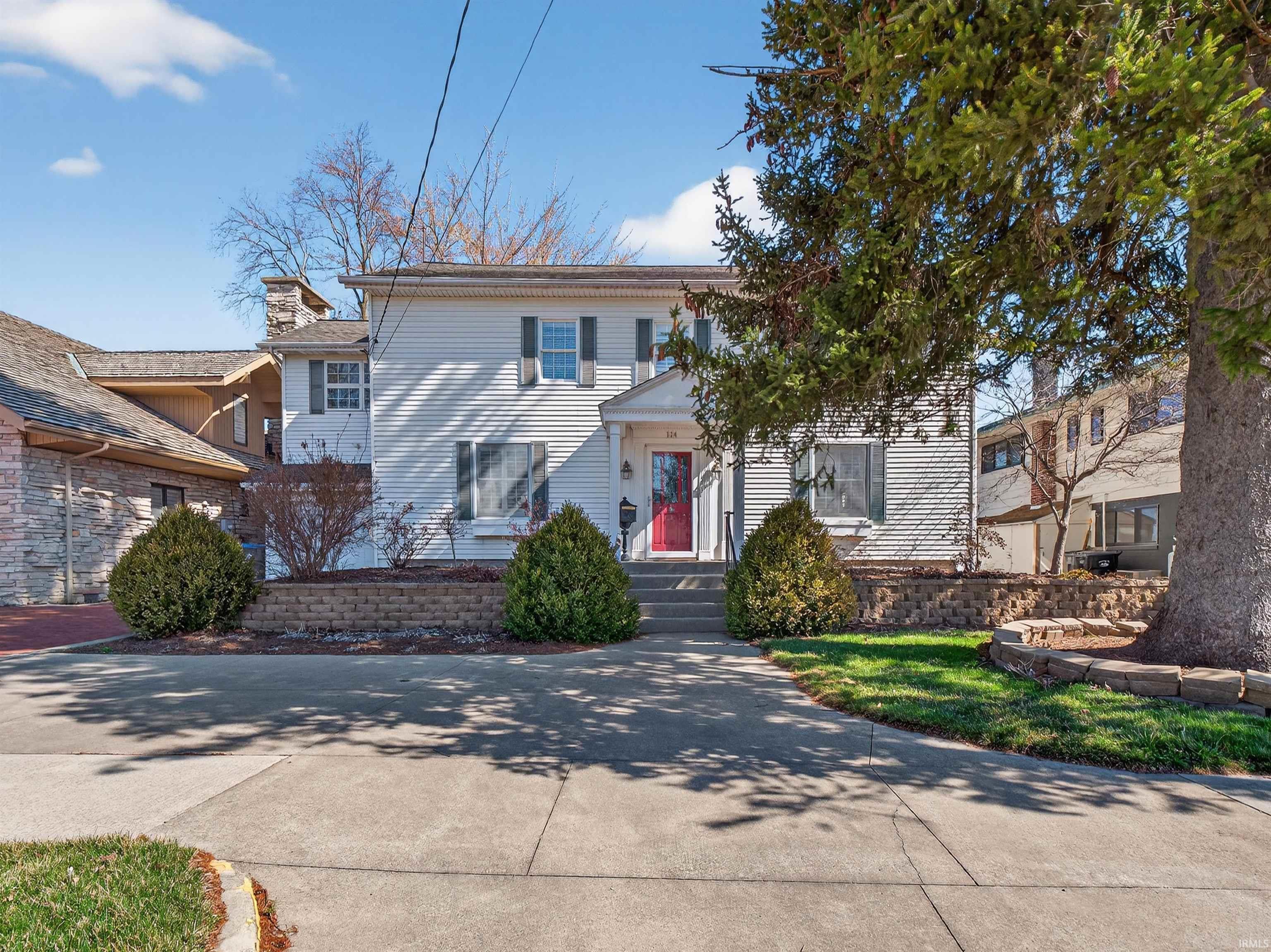 Image 1: View of front of house featuring a chimney, Front Of Structure
