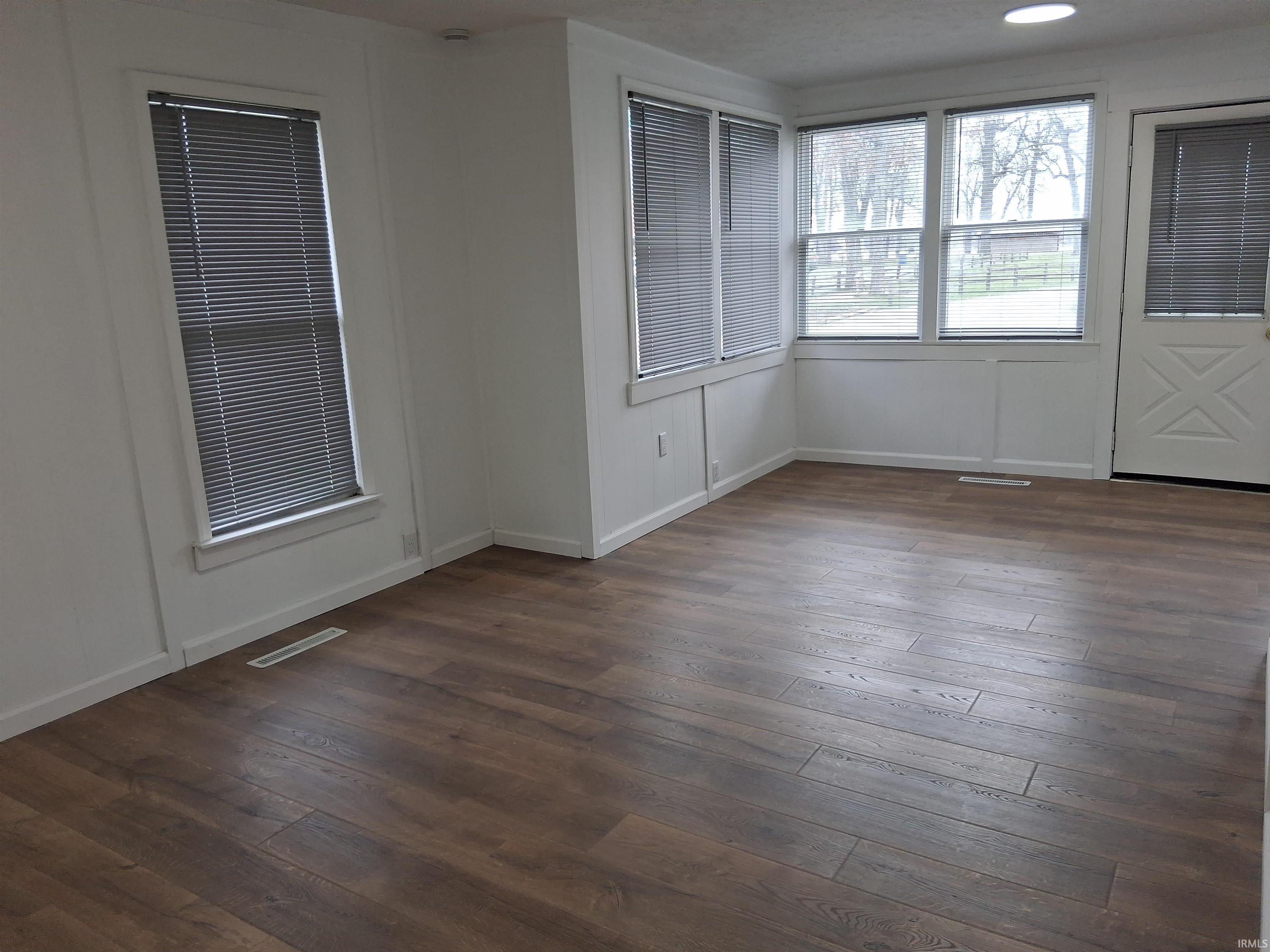 Image 2: Unfurnished room featuring dark wood-type flooring and baseboards, Other Image 2: Unfurnished room featuring dark wood-type flooring and baseboards, Other