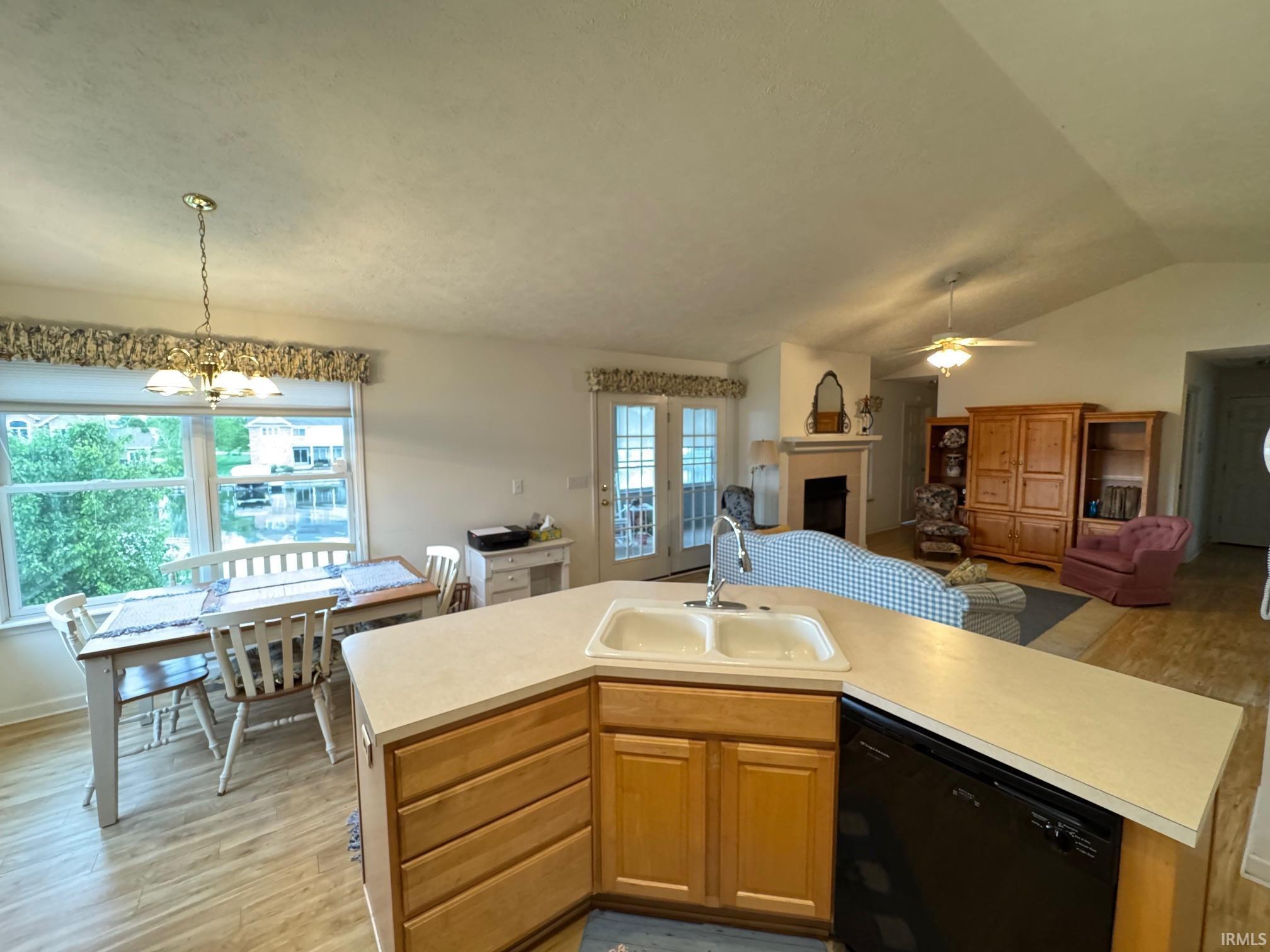 Image 3: Kitchen island with a double basin sink and integrated dishwasher, Kitchen