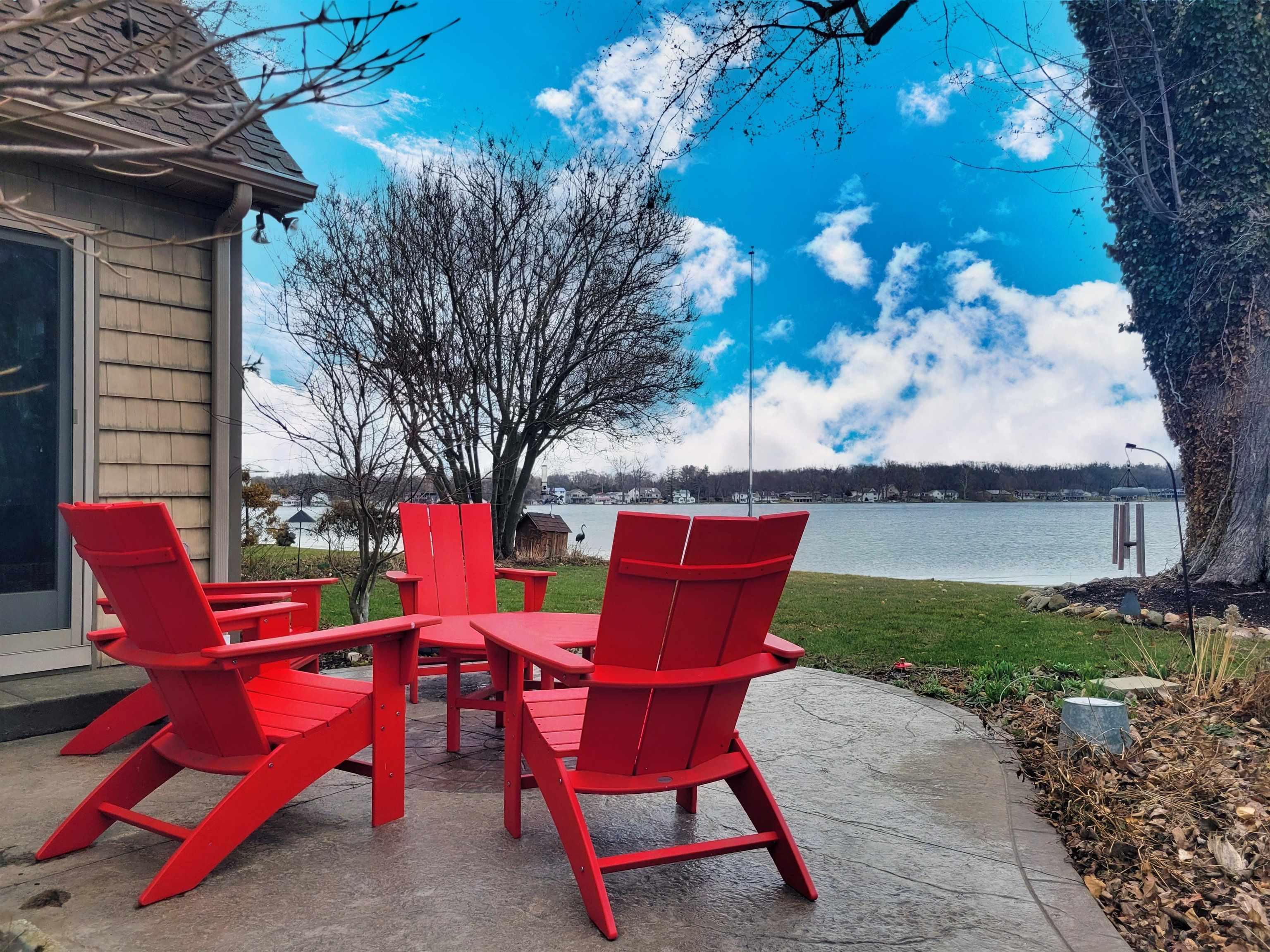 Image 0: View of patio featuring a water view, Patio