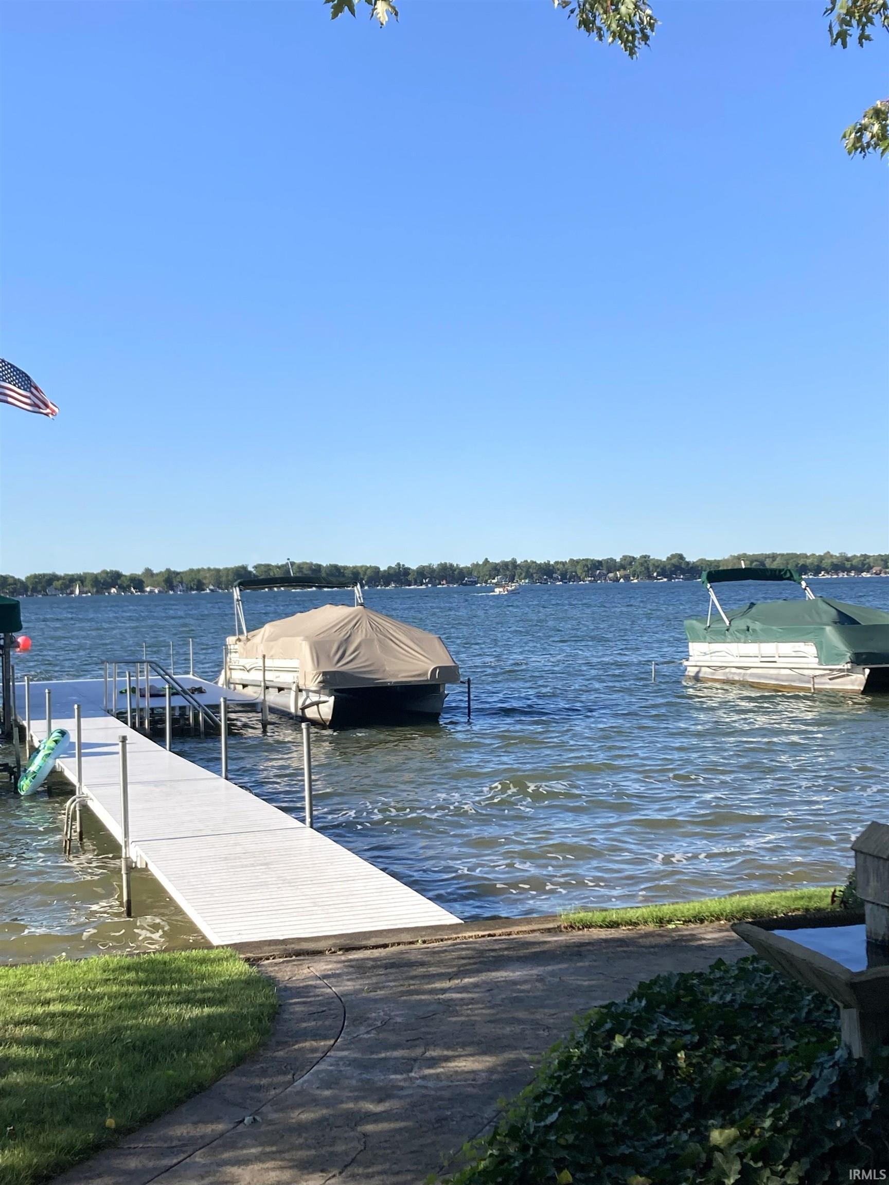Image 3: Dock featuring a water view, Dock