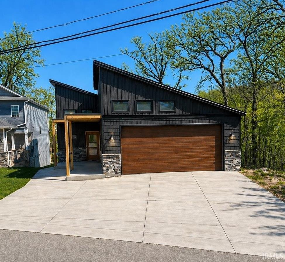 Image 0: Due to ongoing construction, photos have been edited. Final landscape and driveway may be different than depicted., Front Of Structure