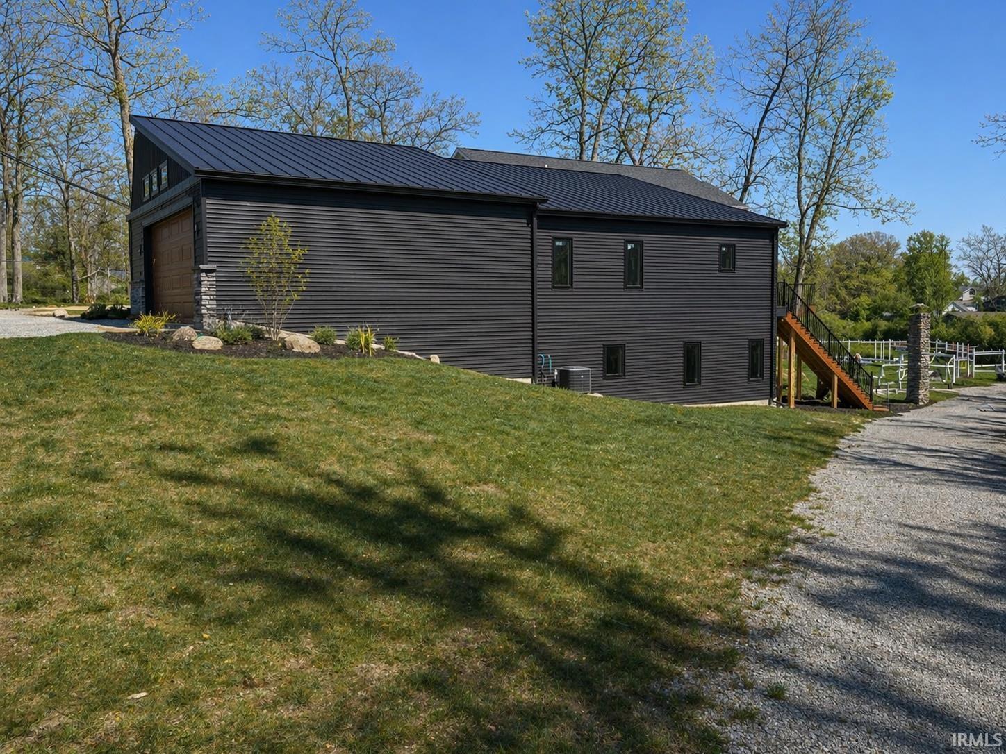 Image 1: Due to ongoing construction, photos have been edited. Final landscape may be different than depicted.