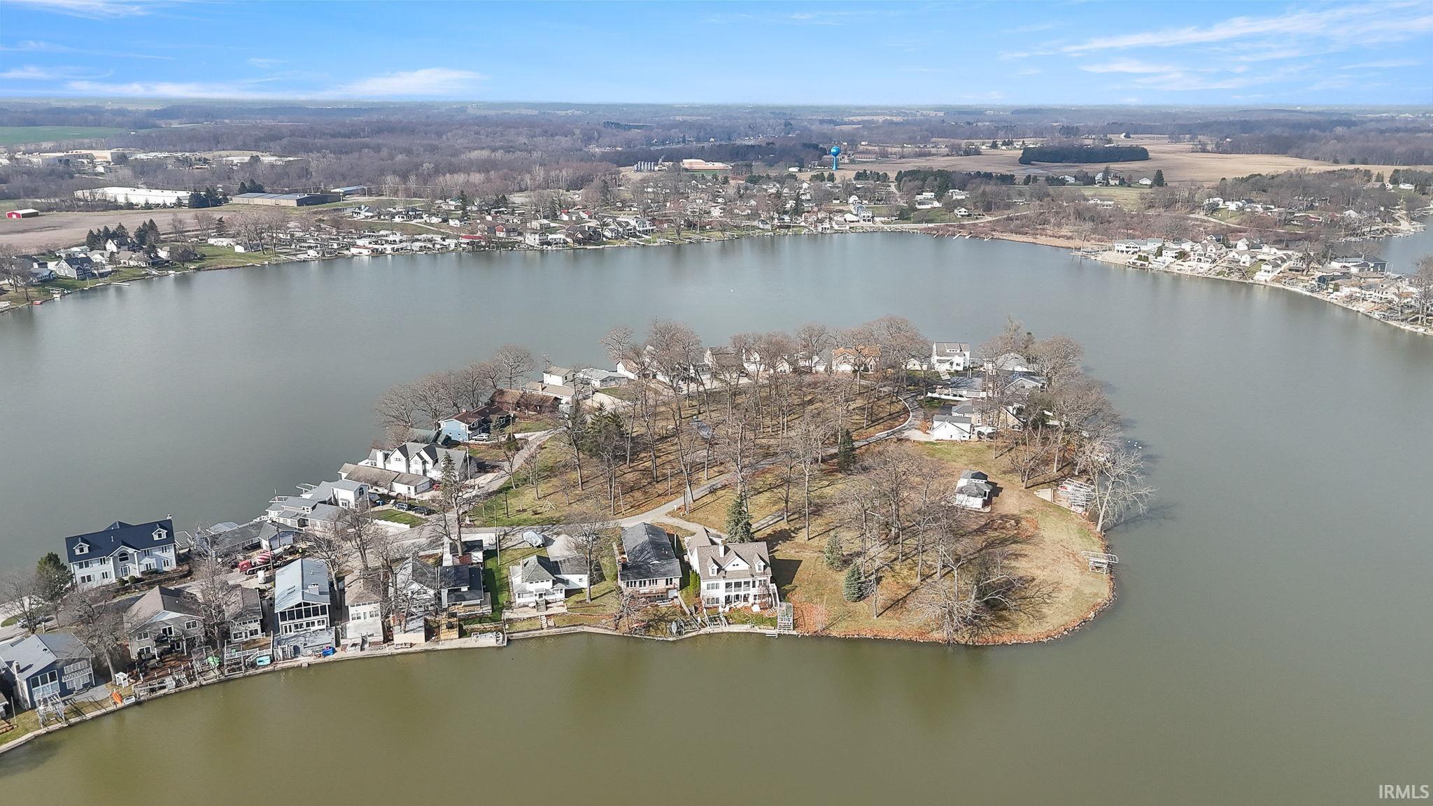 Image 3: Aerial view of property and surrounding area featuring a nearby body of water and nearby suburban area, Aerial View Image 3: Aerial view of property and surrounding area featuring a nearby body of water and nearby suburban area, Aerial View