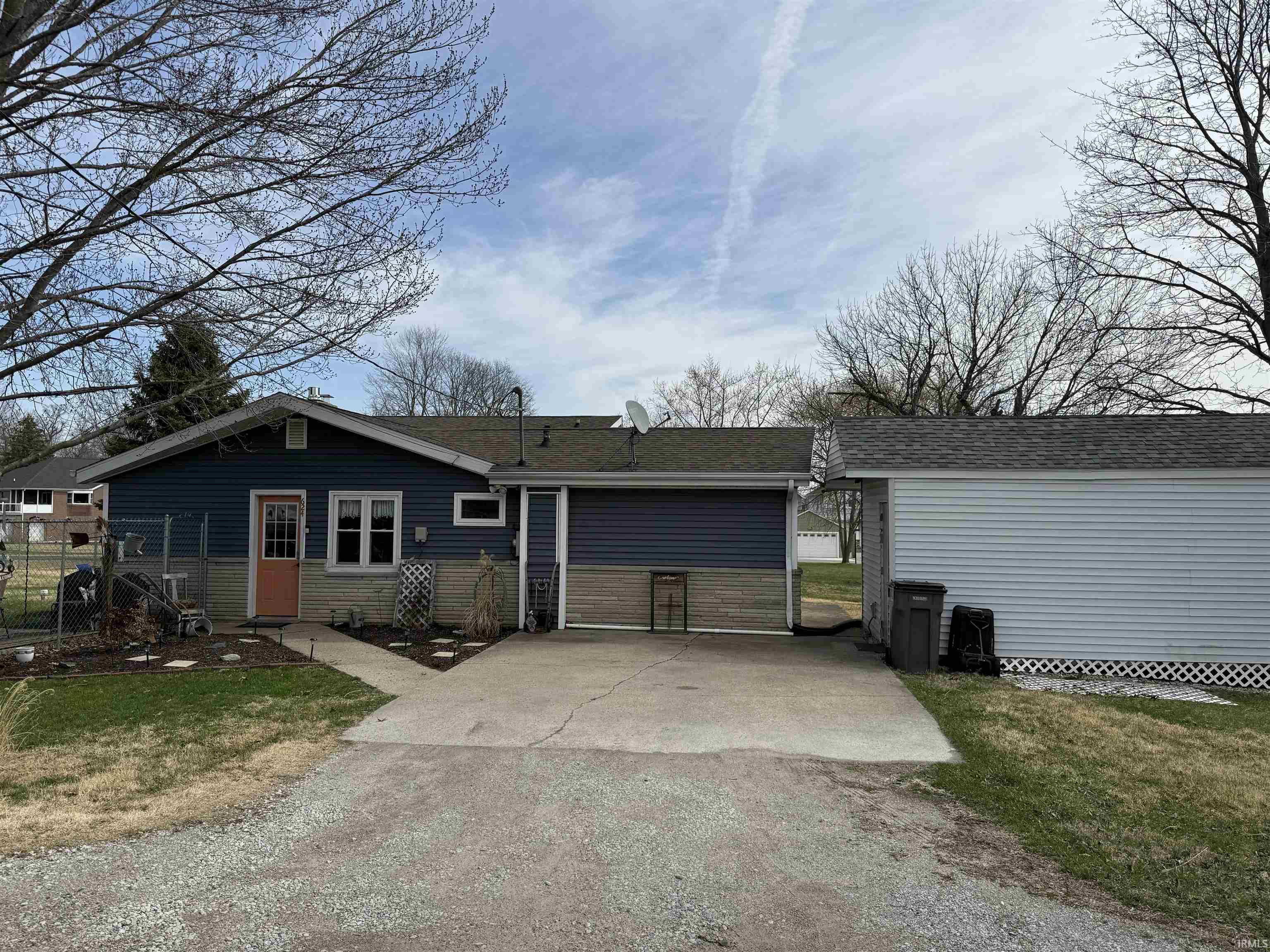 Image 0: View of front of home with a shingled roof and driveway, Front Of Structure Image 0: View of front of home with a shingled roof and driveway, Front Of Structure
