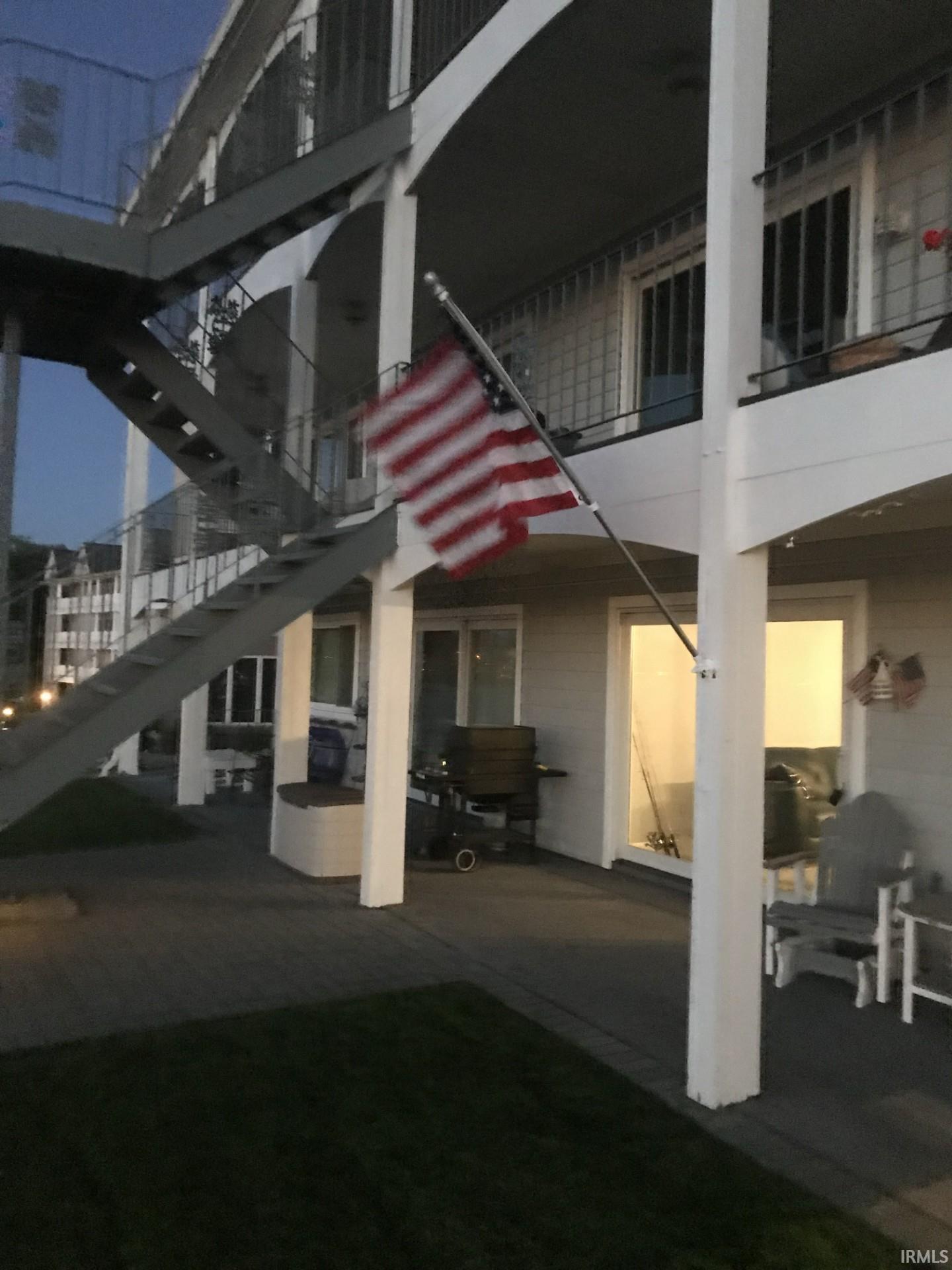 Image 0: View of community featuring stairs and a balcony, Community