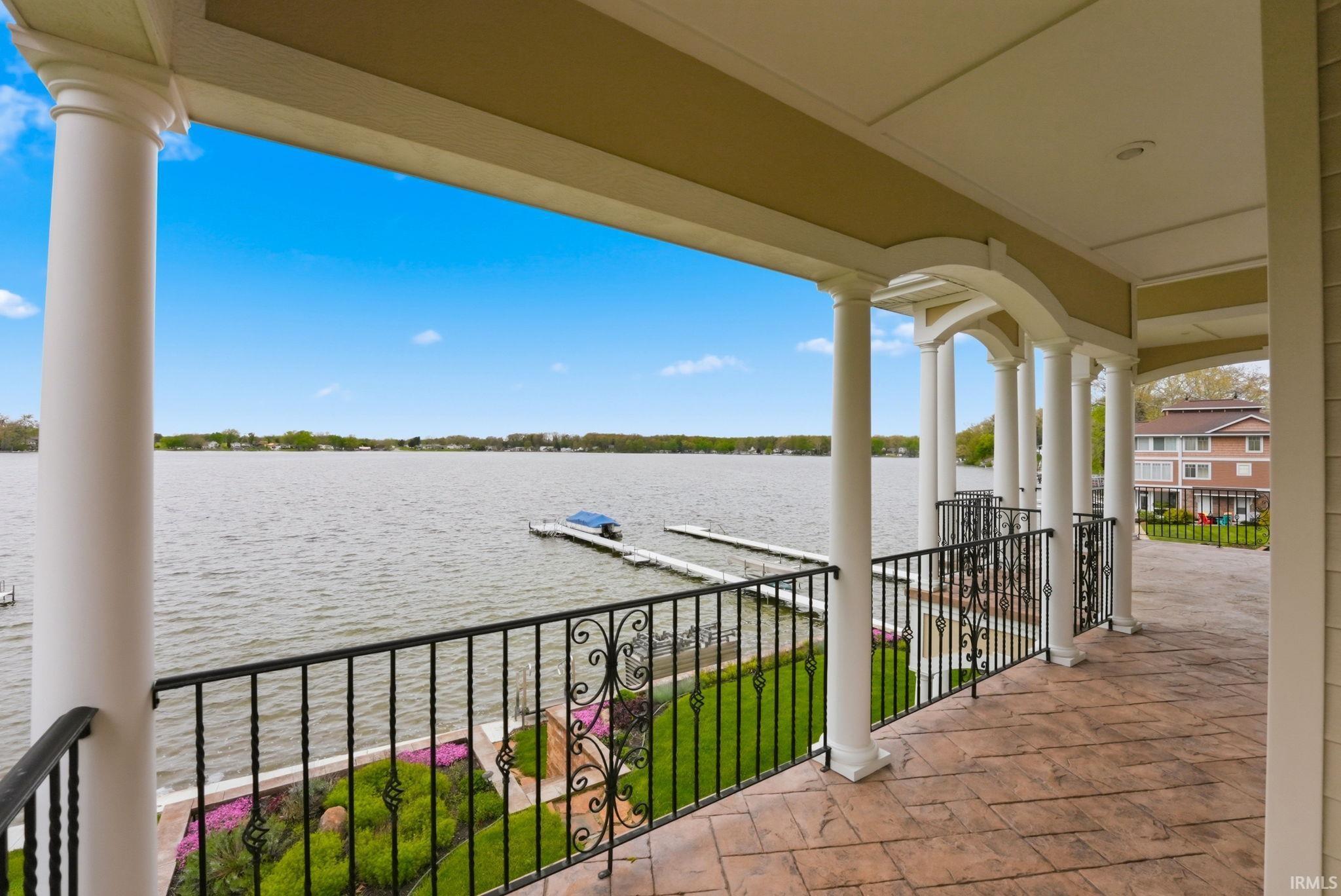 Image 2: Covered patio featuring stamped concrete flooring, Balcony