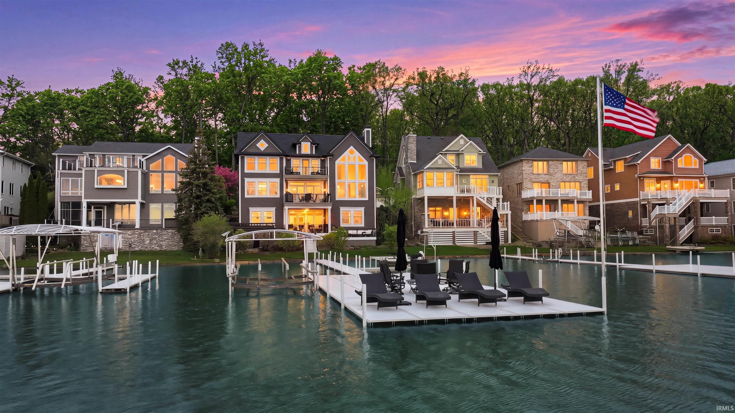 Image 2: Lakefront property featuring multiple residences with water access, Dock Image 2: Lakefront property featuring multiple residences with water access, Dock