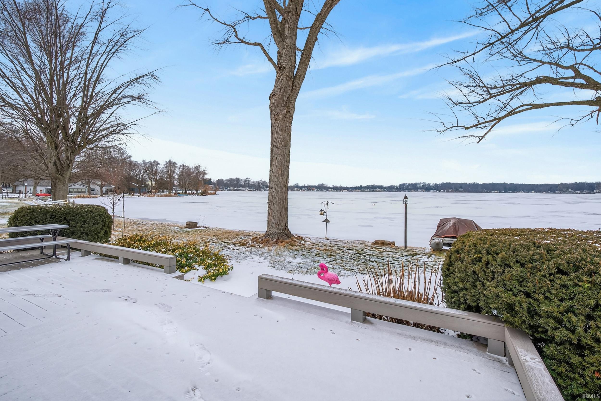Image 1: Exterior space featuring a deck with water view, Deck