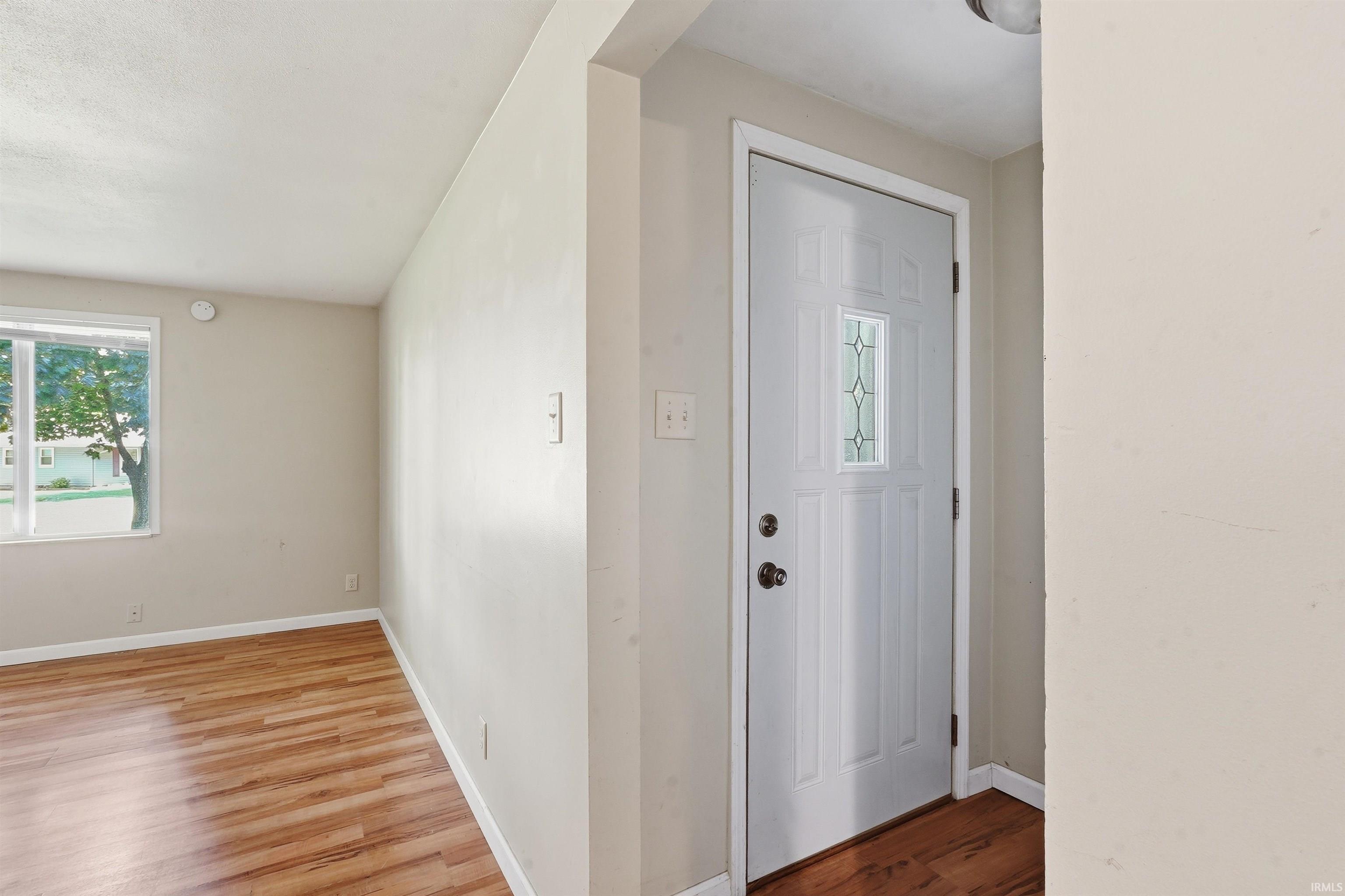 Image 2: Entry door with decorative glass insert, Entrance Foyer Image 2: Entry door with decorative glass insert, Entrance Foyer