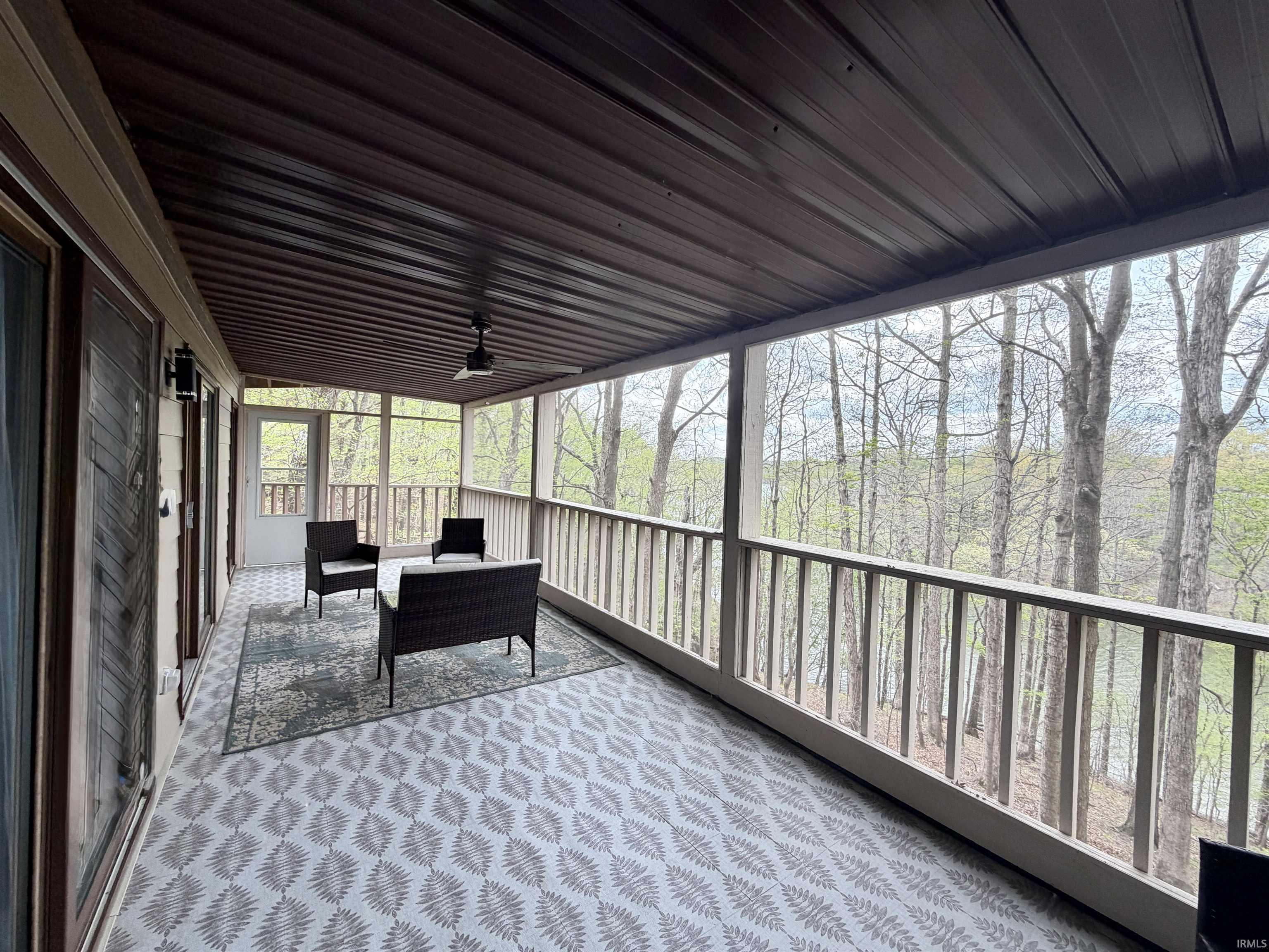Image 1: Sunroom / solarium with an outdoor lounge area and ceiling fan, Sun Room
