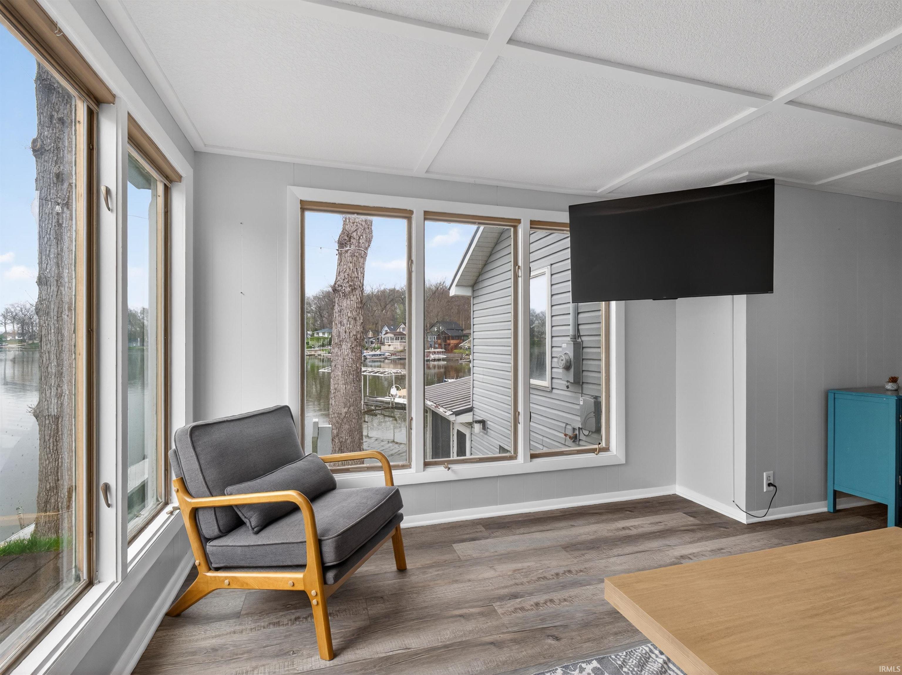 Image 2: Sitting room featuring dark wood finished floors and baseboards, Sitting Room
