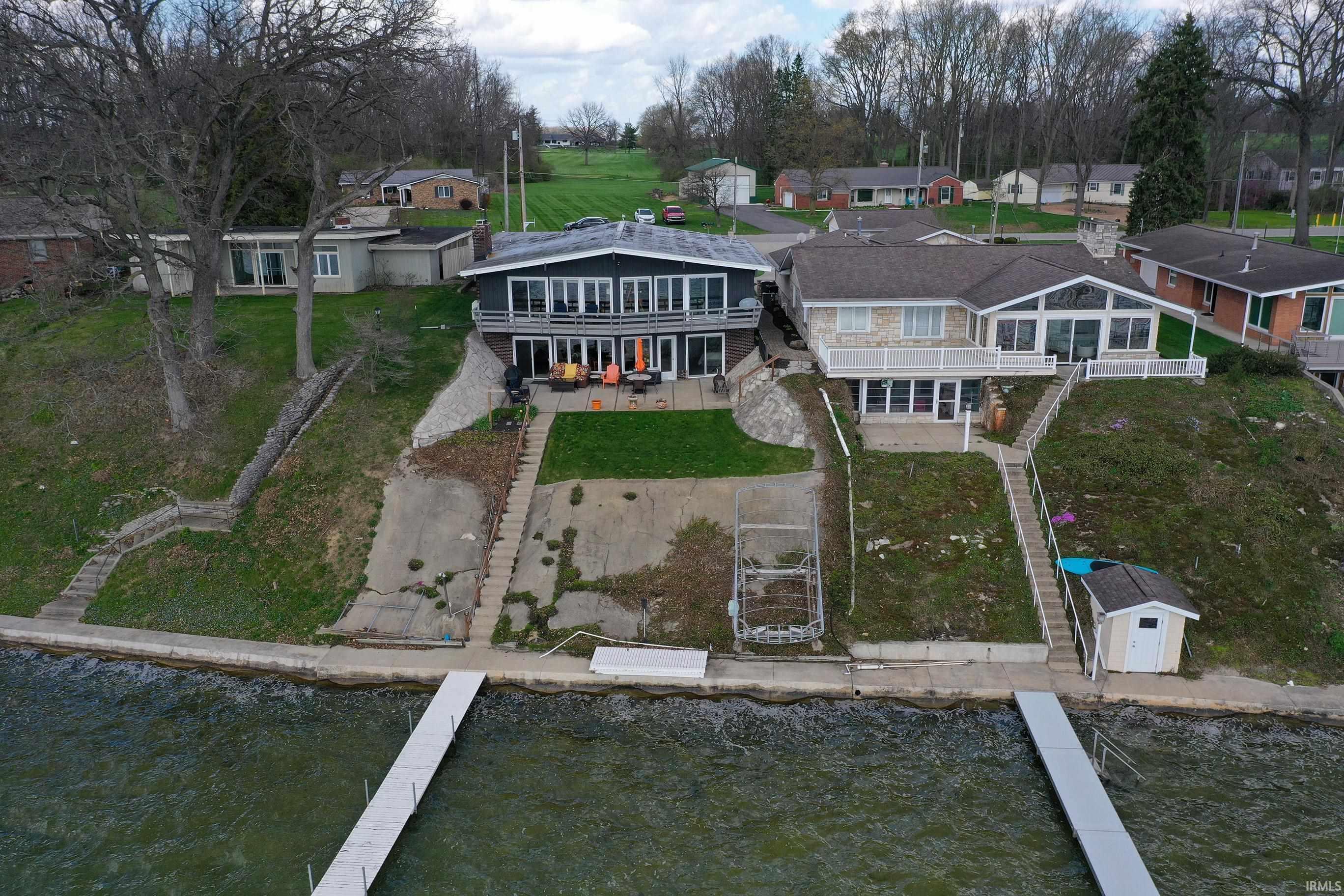 Image 2: Aerial view of residential area with a nearby body of water, Aerial View Image 2: Aerial view of residential area with a nearby body of water, Aerial View