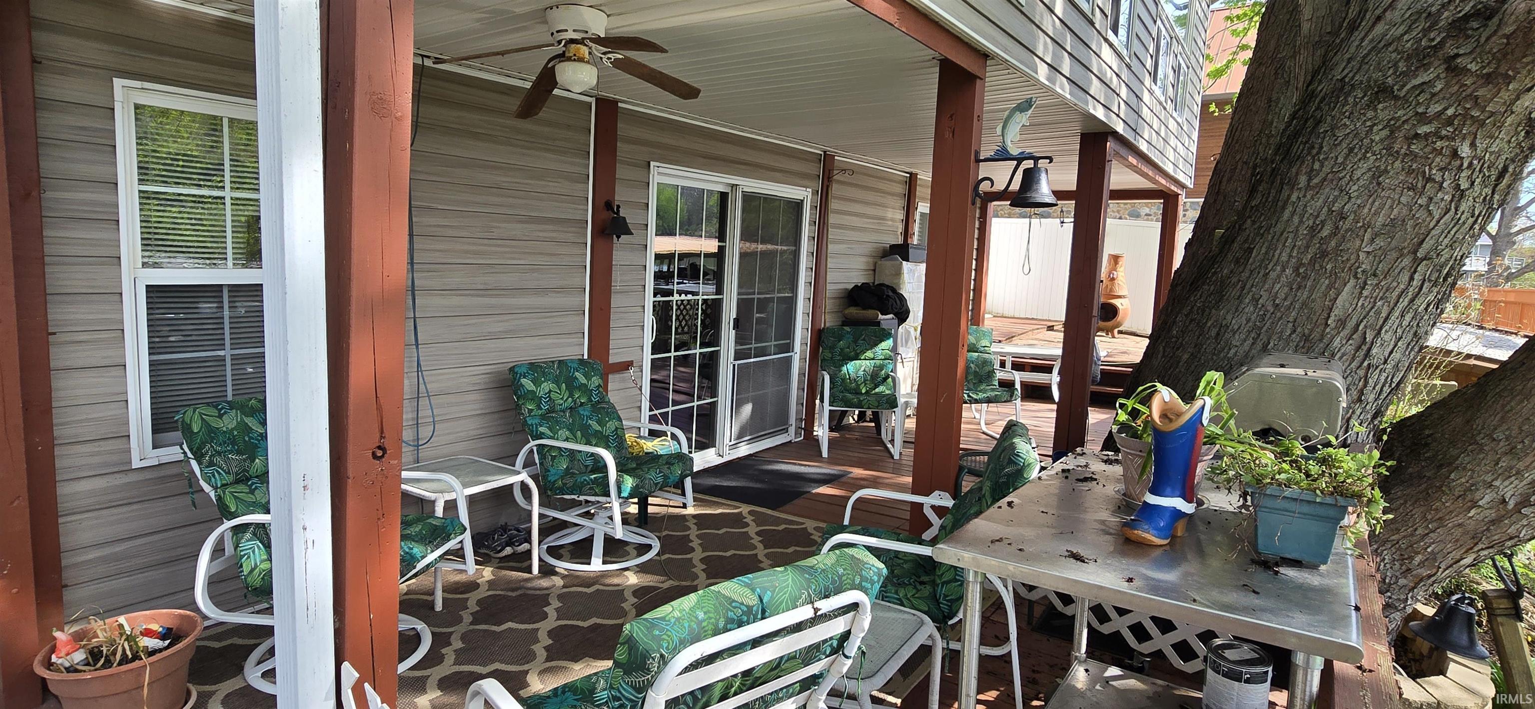 Image 3: View of patio / terrace with a ceiling fan and a deck, Patio
