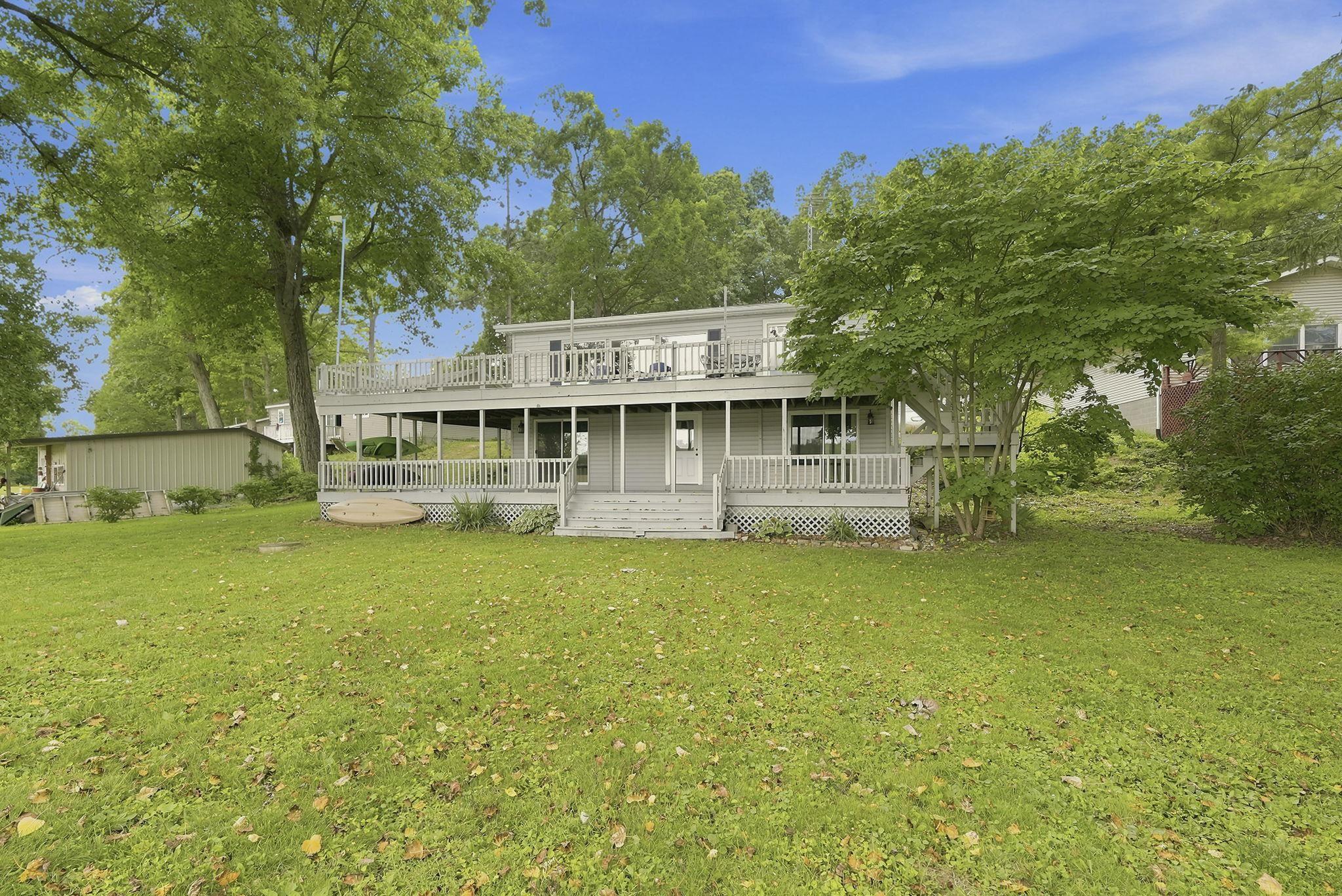 Image 3: Two-story residence with a light gray exterior, Front Of Structure Image 3: Two-story residence with a light gray exterior, Front Of Structure