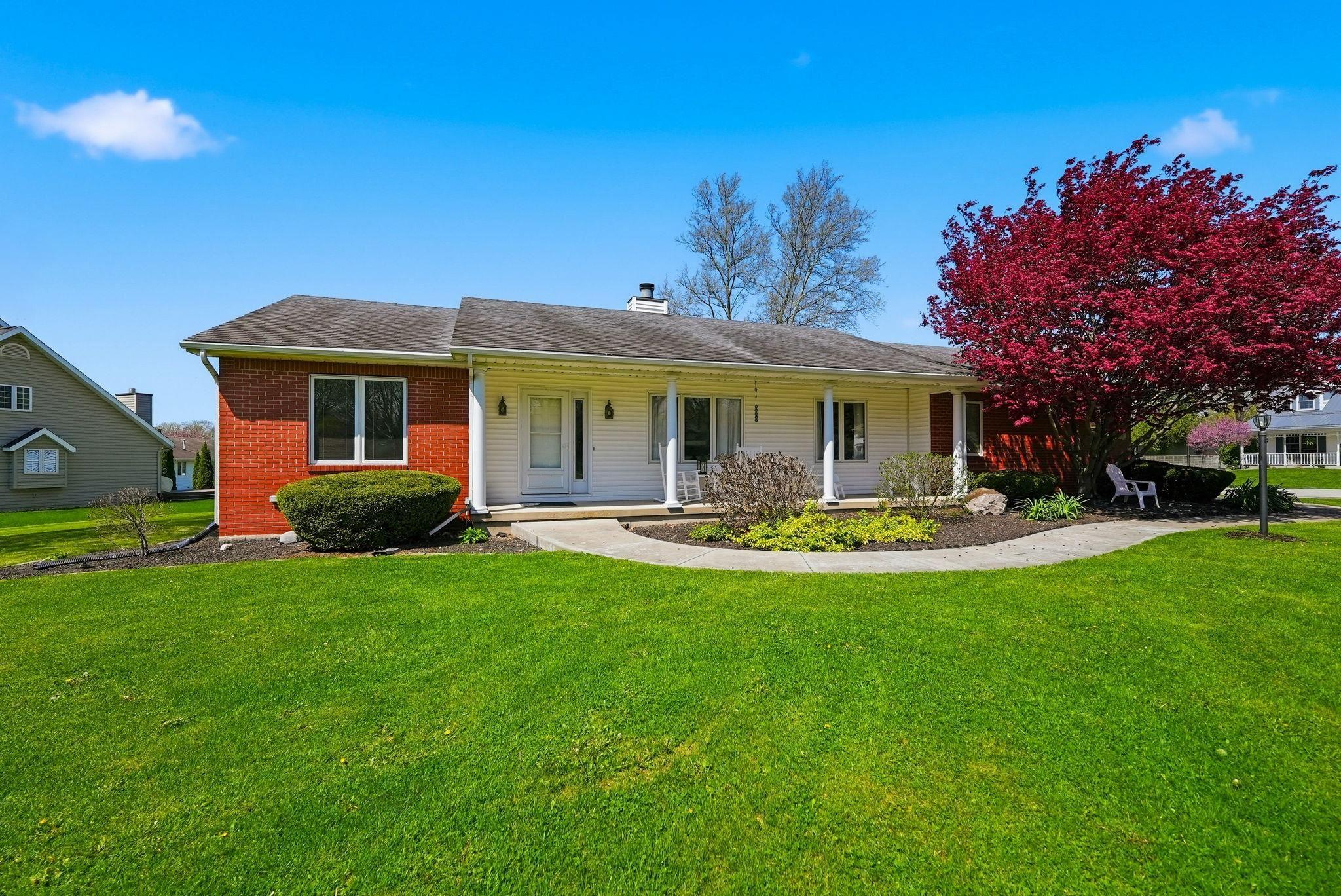 Image 1: Single-story residence featuring a combination of white siding and red brick exterior, Front Of Structure Image 1: Single-story residence featuring a combination of white siding and red brick exterior, Front Of Structure
