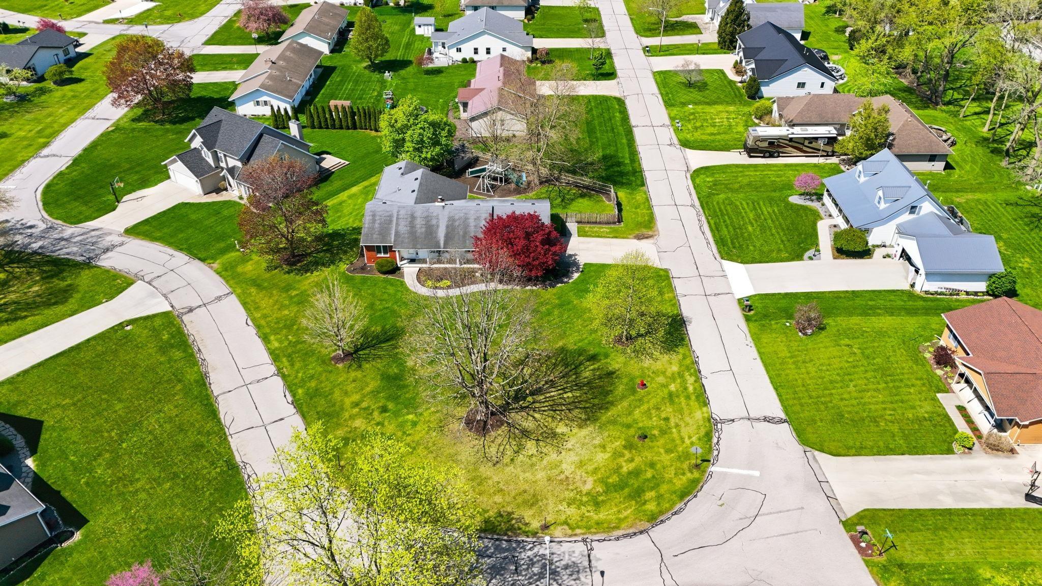 Image 3: Aerial perspective showcasing a residential neighborhood with established homes and mature landscaping, Aerial View Image 3: Aerial perspective showcasing a residential neighborhood with established homes and mature landscaping, Aerial View