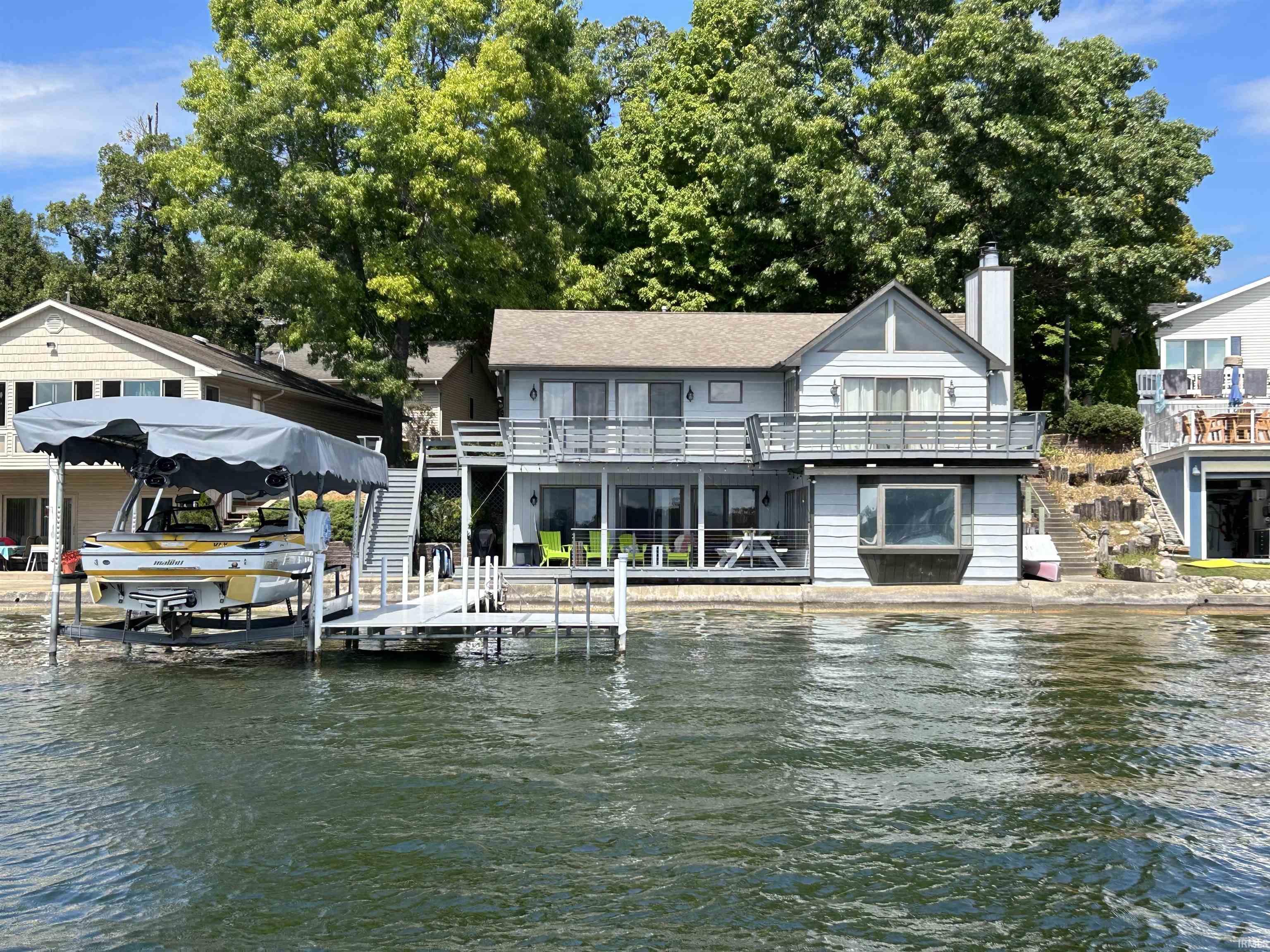 Image 1: Dock area featuring stairs and a water view, Dock Image 1: Dock area featuring stairs and a water view, Dock