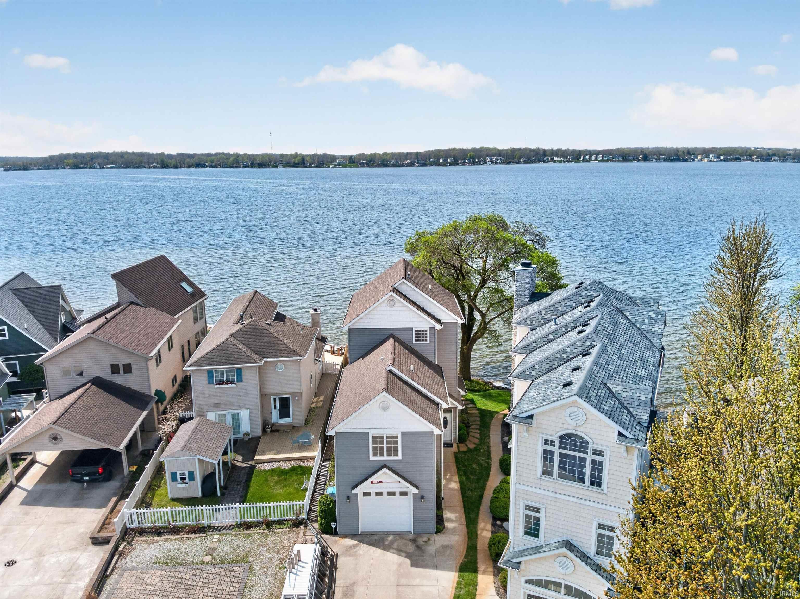 Image 3: Aerial view of residential area with a large body of water, Aerial View Image 3: Aerial view of residential area with a large body of water, Aerial View