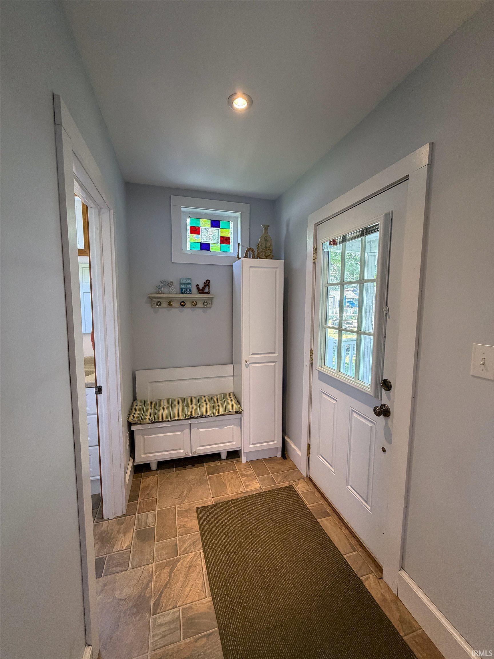 Image 3: Entryway featuring large format tile flooring and recessed lighting, Mud Room