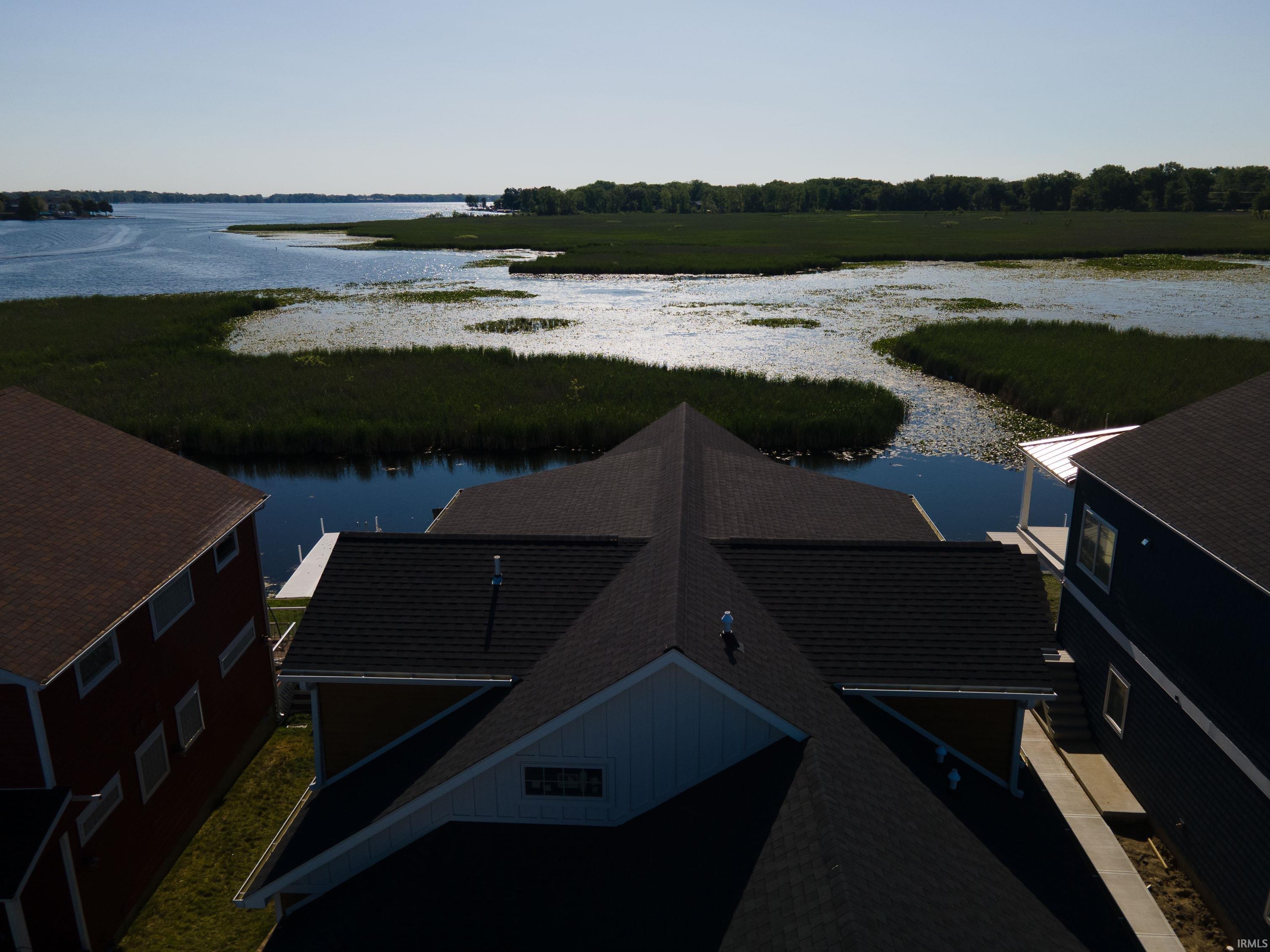 Image 2: Expansive water frontage with lush marshland, View Image 2: Expansive water frontage with lush marshland, View