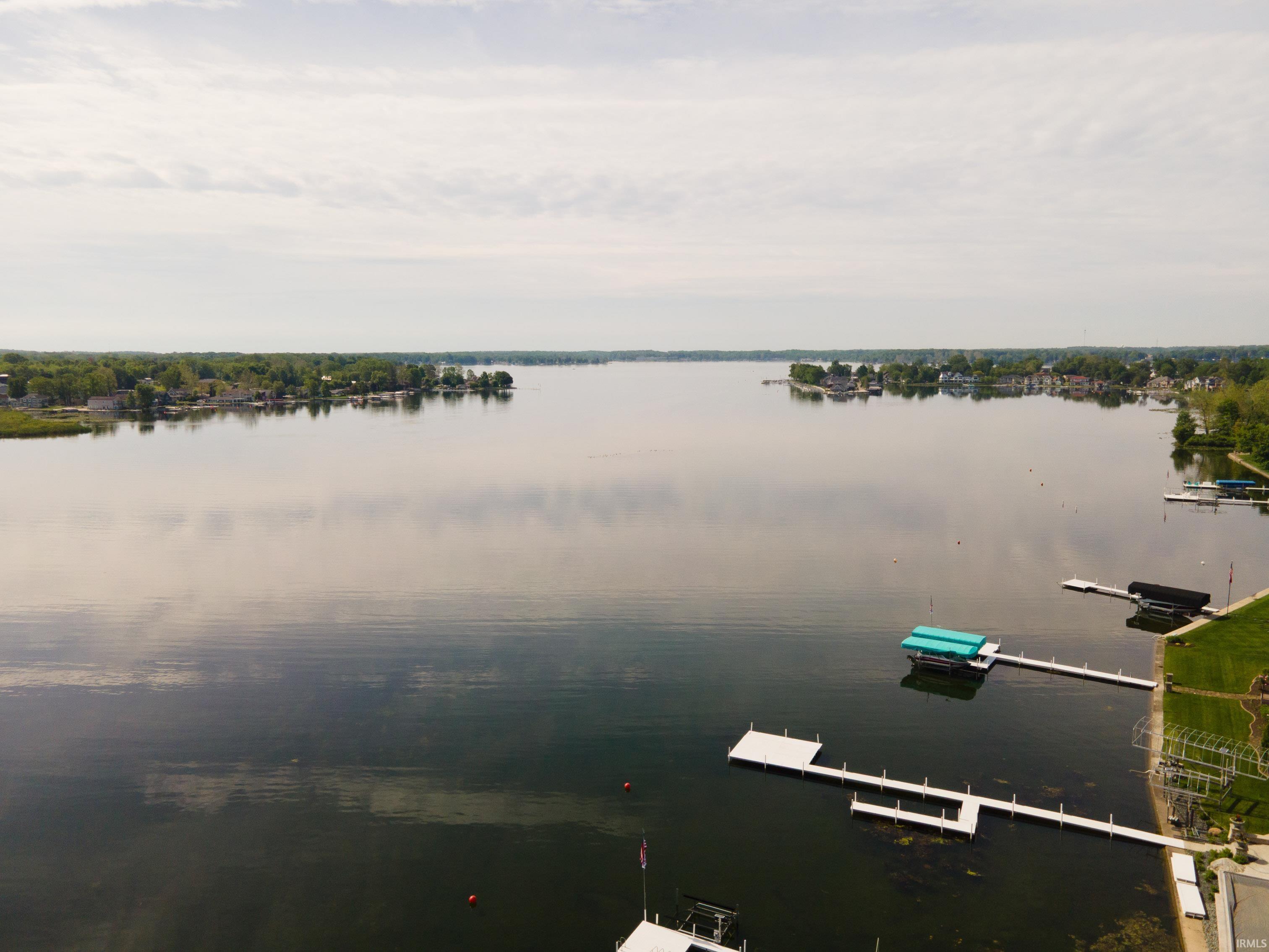 Image 2: Expansive waterfront property featuring private docks and direct lake access, View Image 2: Expansive waterfront property featuring private docks and direct lake access, View
