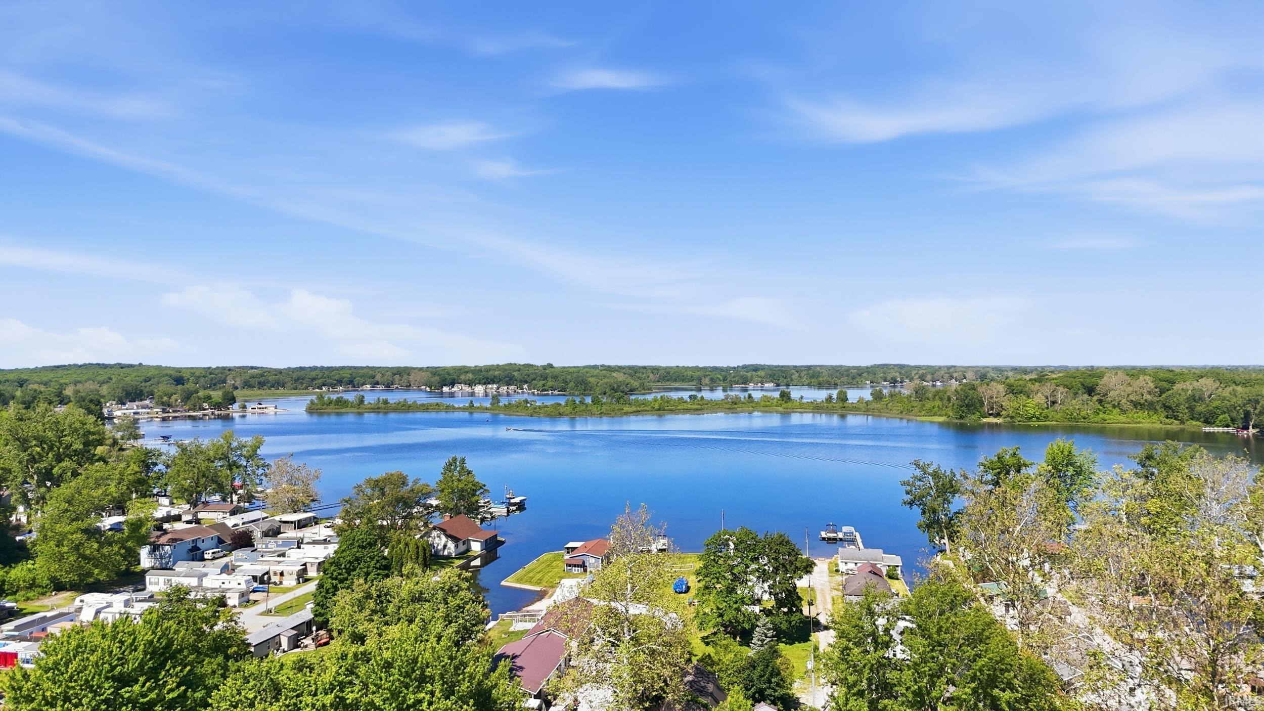 Image 3: Expansive waterfront offering direct lake access, View