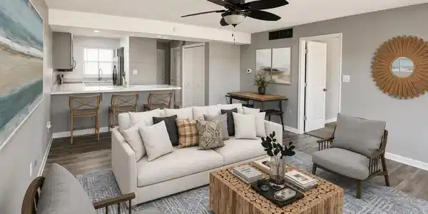Image 3: Open-concept living area featuring wood-finish flooring, a ceiling fan, and light gray walls, Living Room Image 3: Open-concept living area featuring wood-finish flooring, a ceiling fan, and light gray walls, Living Room