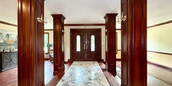 Image 3: Grand entry foyer featuring a double-door entry, decorative transom, and sidelights, Entrance Foyer Image 3: Grand entry foyer featuring a double-door entry, decorative transom, and sidelights, Entrance Foyer