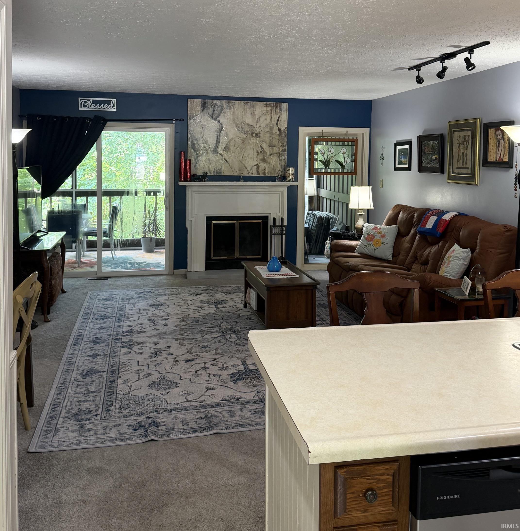 Image 3: new carpet, wood burning fireplace, Living Room Image 3: new carpet, wood burning fireplace, Living Room