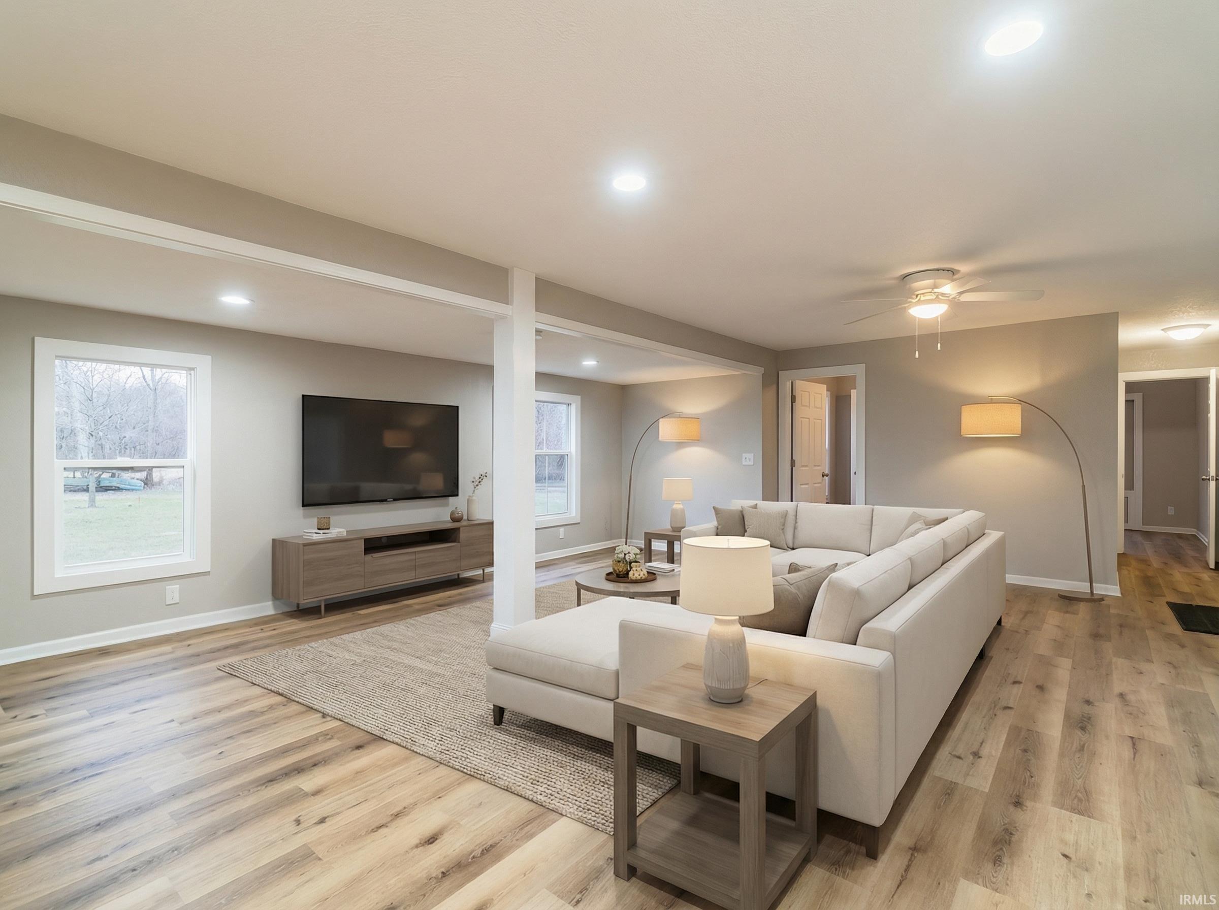 Image 1: Living area featuring ceiling fan, light wood-type flooring, and recessed lighting, Virtual Staged living room Image 1: Living area featuring ceiling fan, light wood-type flooring, and recessed lighting, Virtual Staged living room