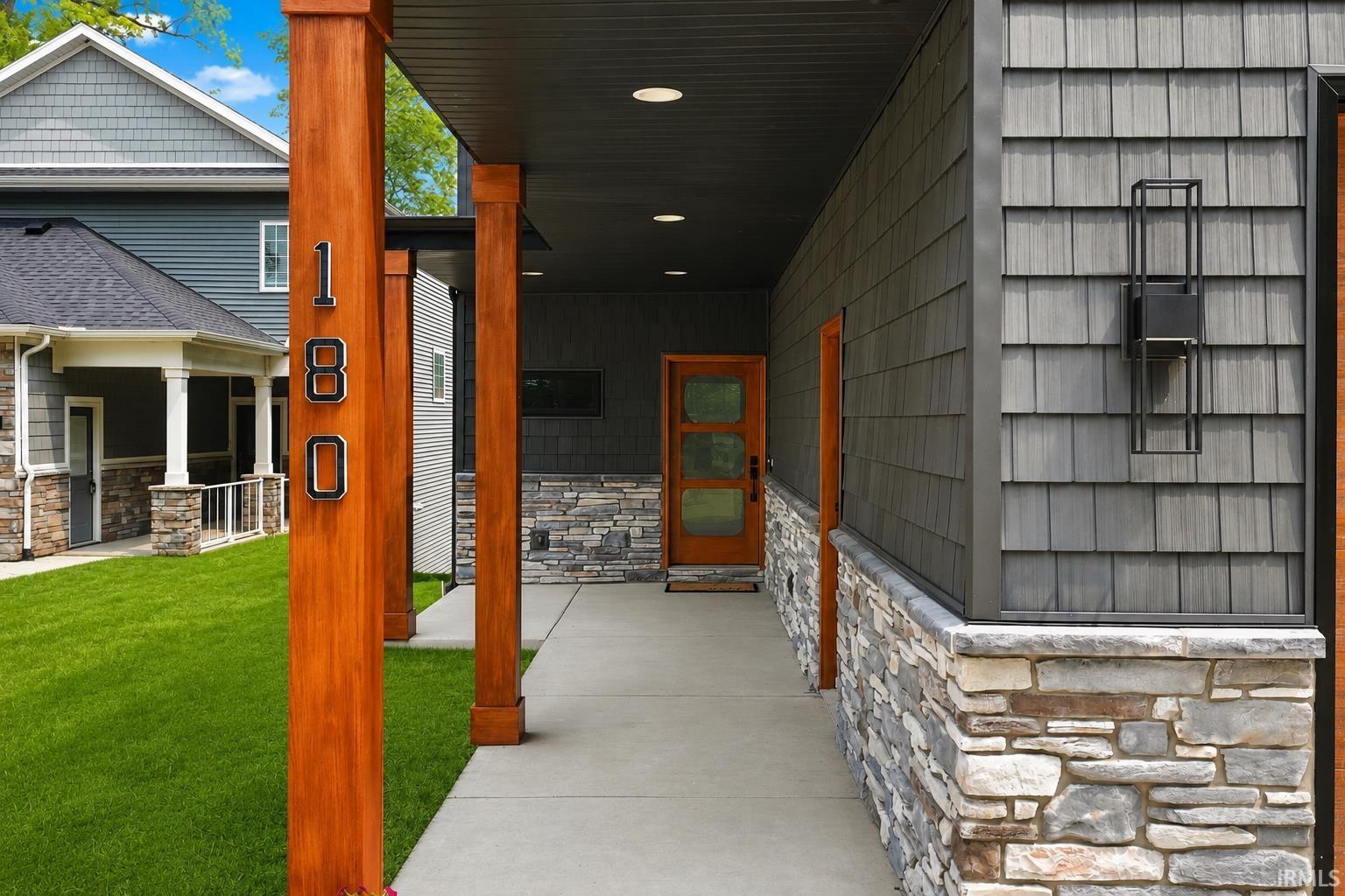 Image 1: Lawn is AI generated, Front Entrance Image 1: Lawn is AI generated, Front Entrance