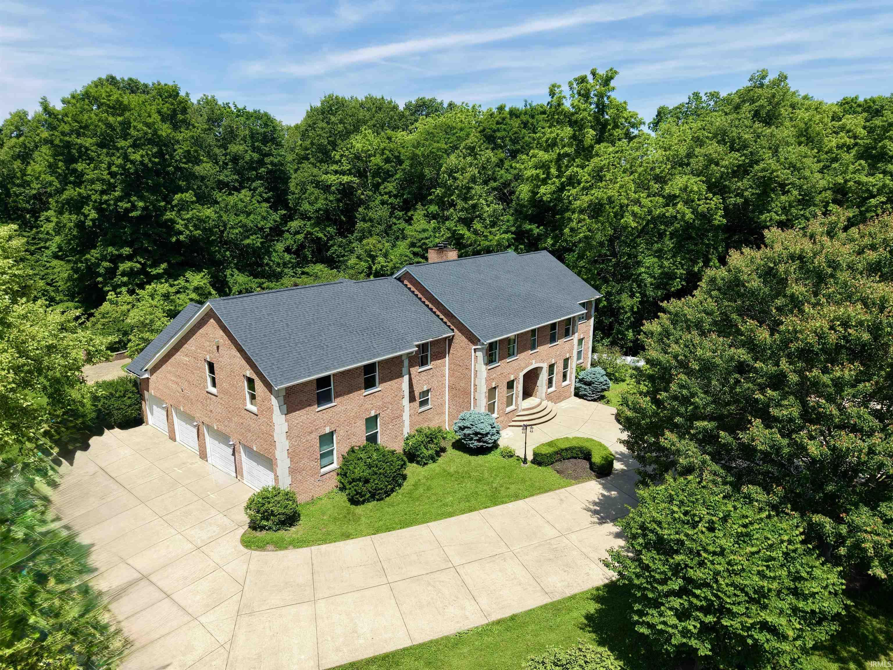 Image 1: Brick exterior with dark gray roofing, Aerial View Image 1: Brick exterior with dark gray roofing, Aerial View