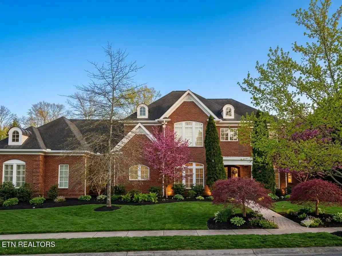 Image 1: All brick, executive home