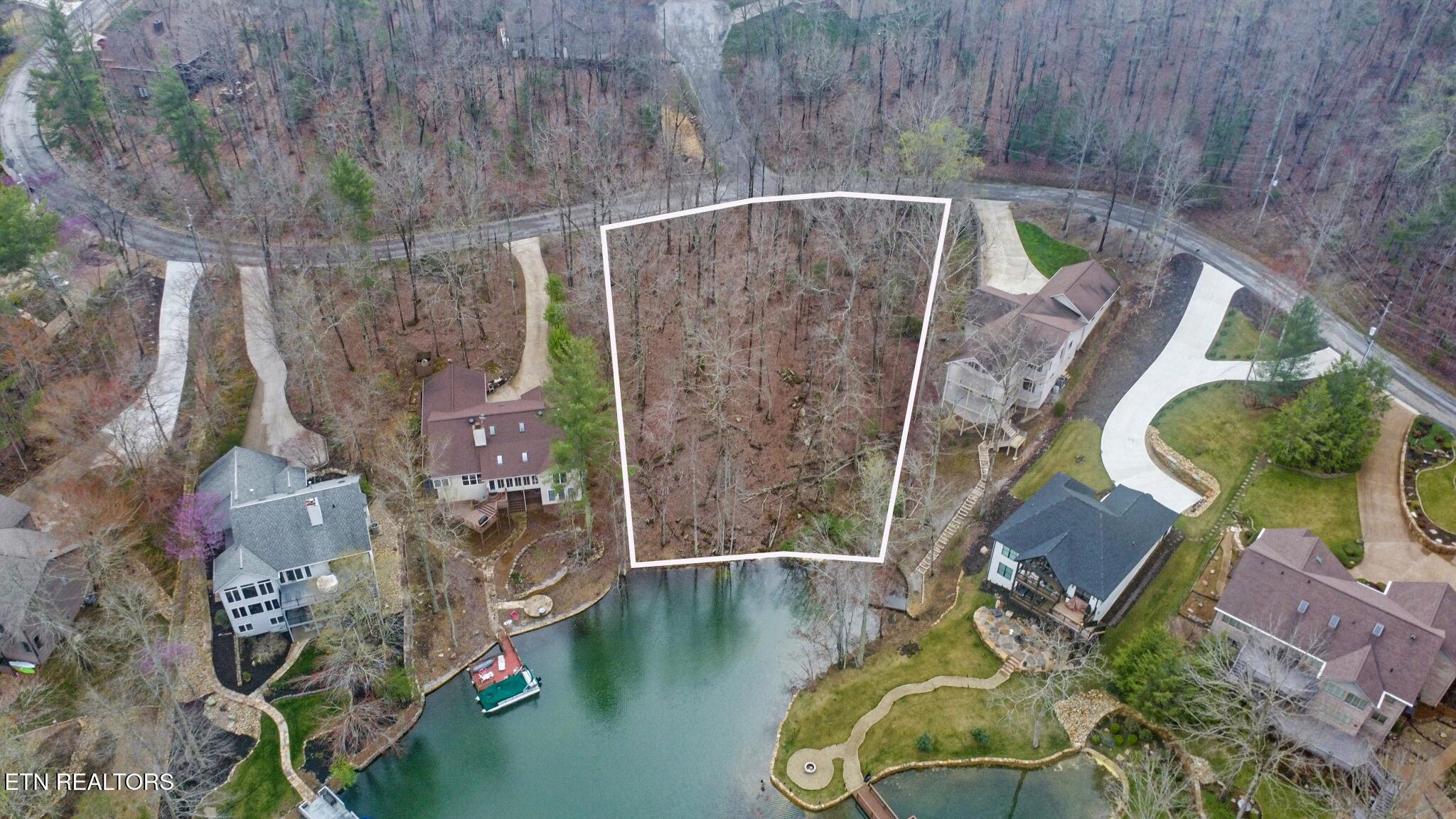 Image 4: Aerial view from lake- 124' of lakefront