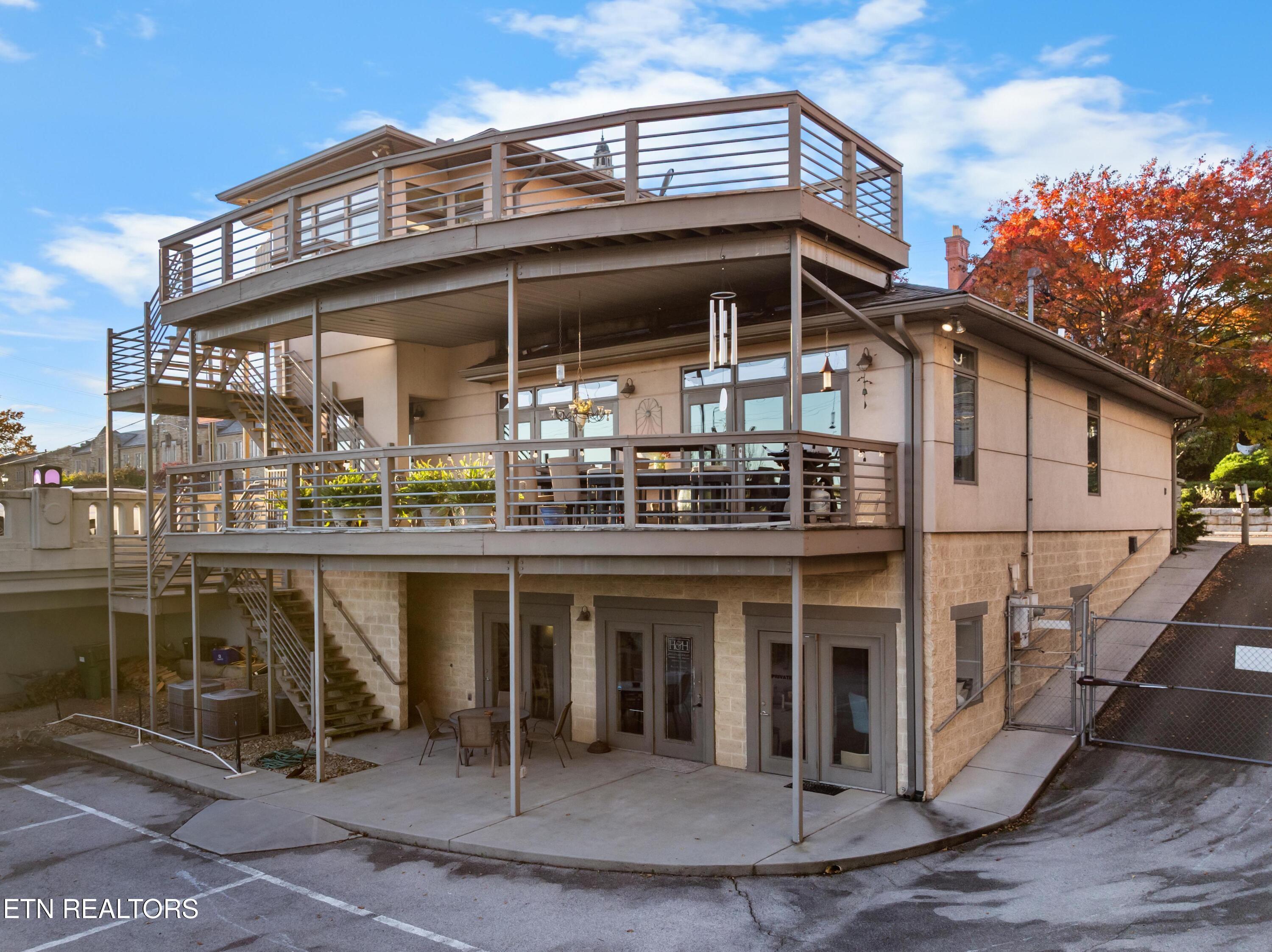 Image 4: Multiple Decks Overlooking River